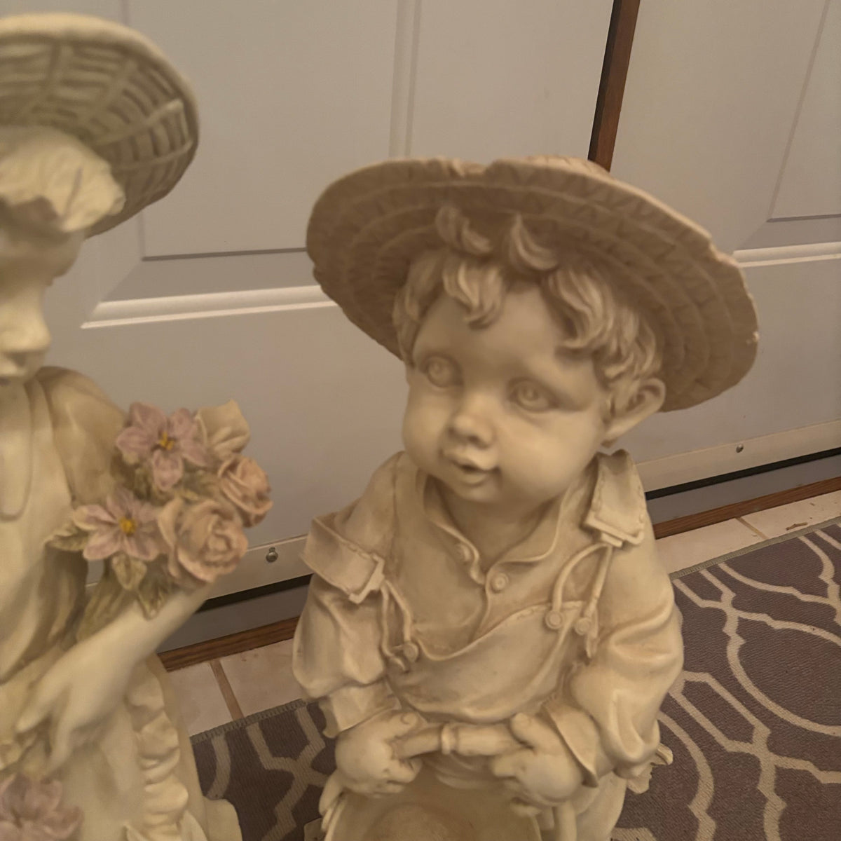 F198 3 22” tall stoneware garden figures