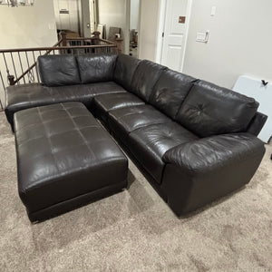 Dark brown leather sectional sofa with large ottoman (small tear on seam of one cushion) - R515