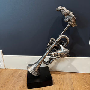24” tall Iron man with trumpet sculpture -J406