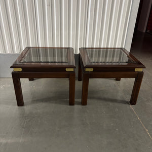 Set of 2 mid century end tables with solid wood frames, smoked glass tops and brass detailing - U608
