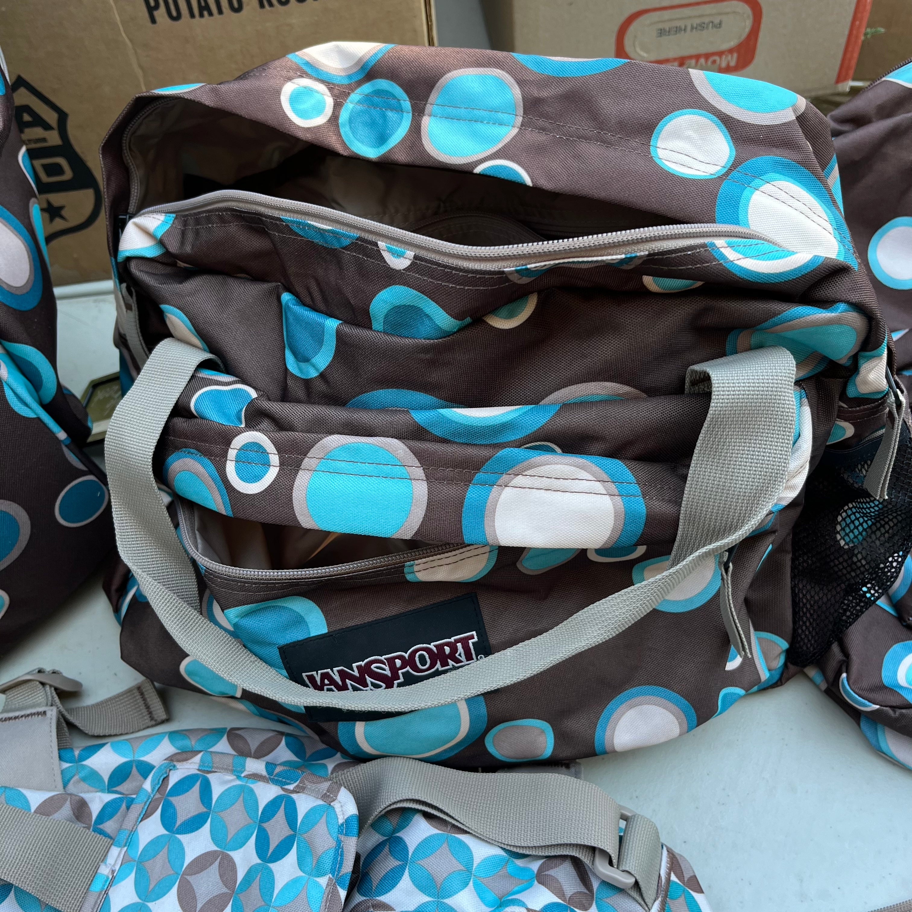 D605 Jansport Polka Dot  Bag Grouping (backpacks and duffel bags)