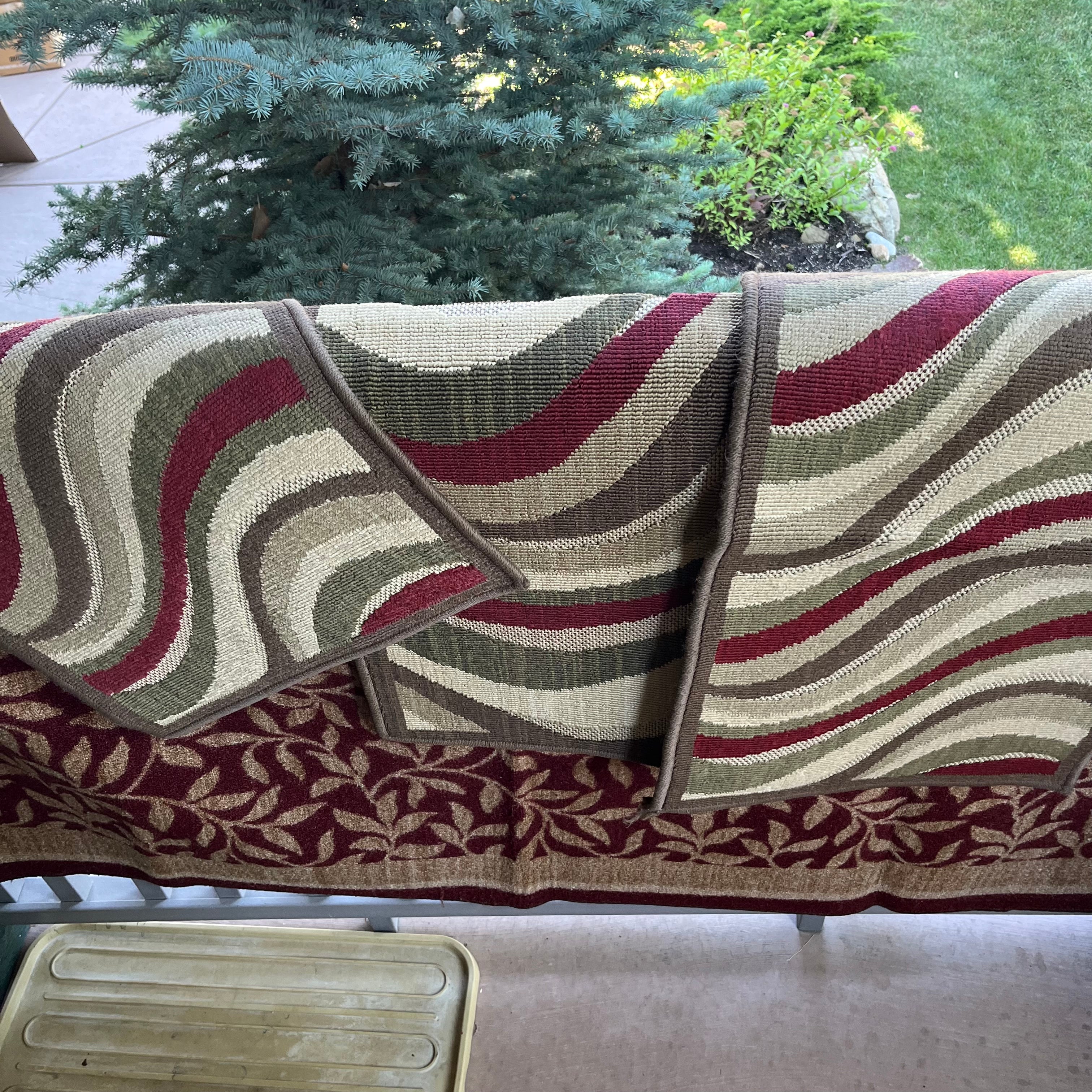 D610 Grouping of 4 area rugs
