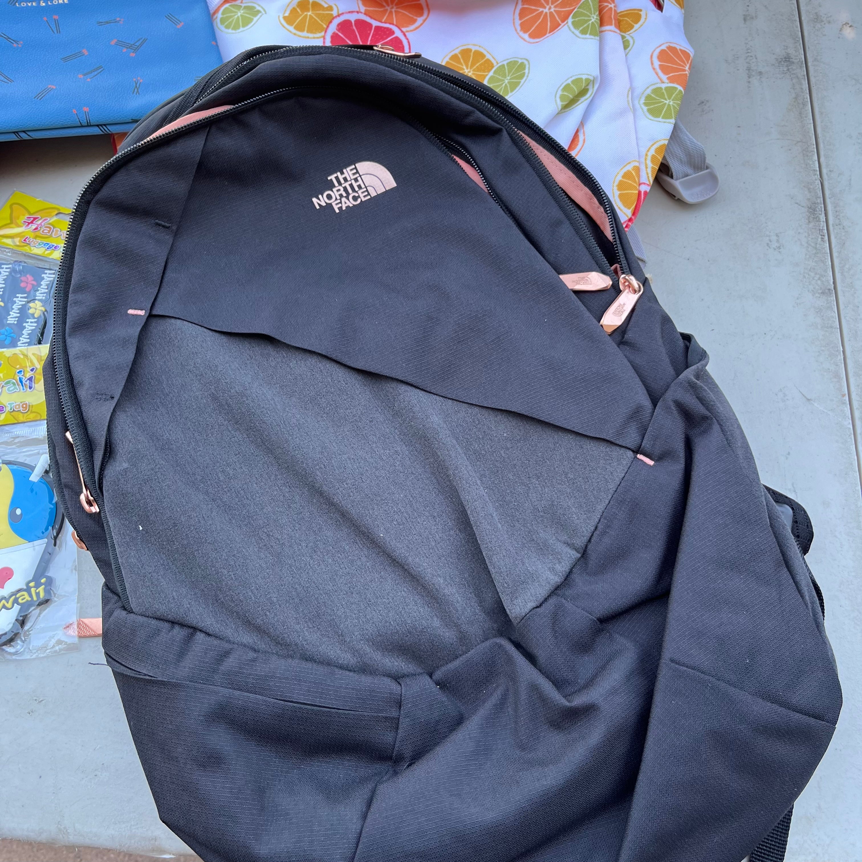 D611 Floral back pack grouping (North Face, Jansport, and Dakine)