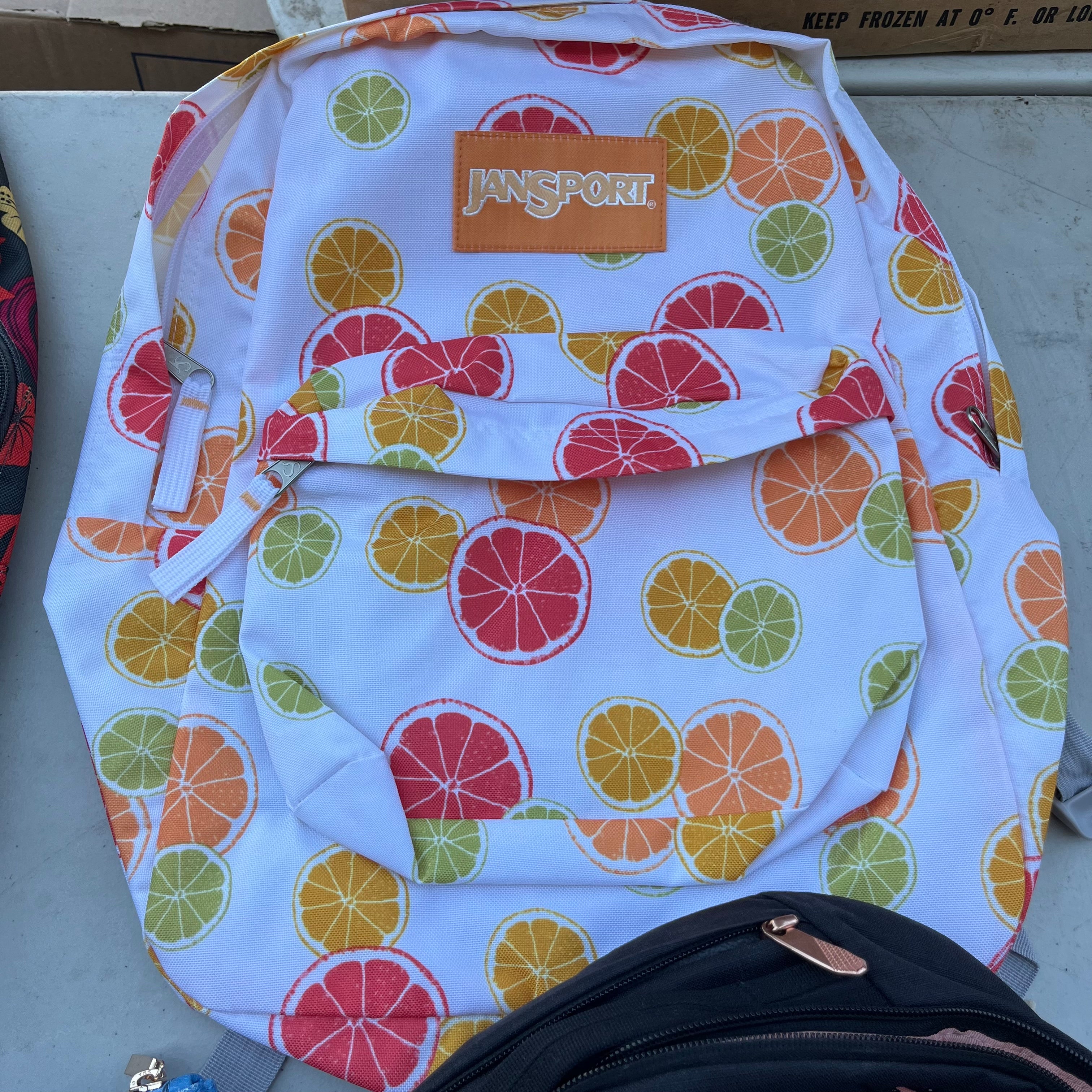 D611 Floral back pack grouping (North Face, Jansport, and Dakine)