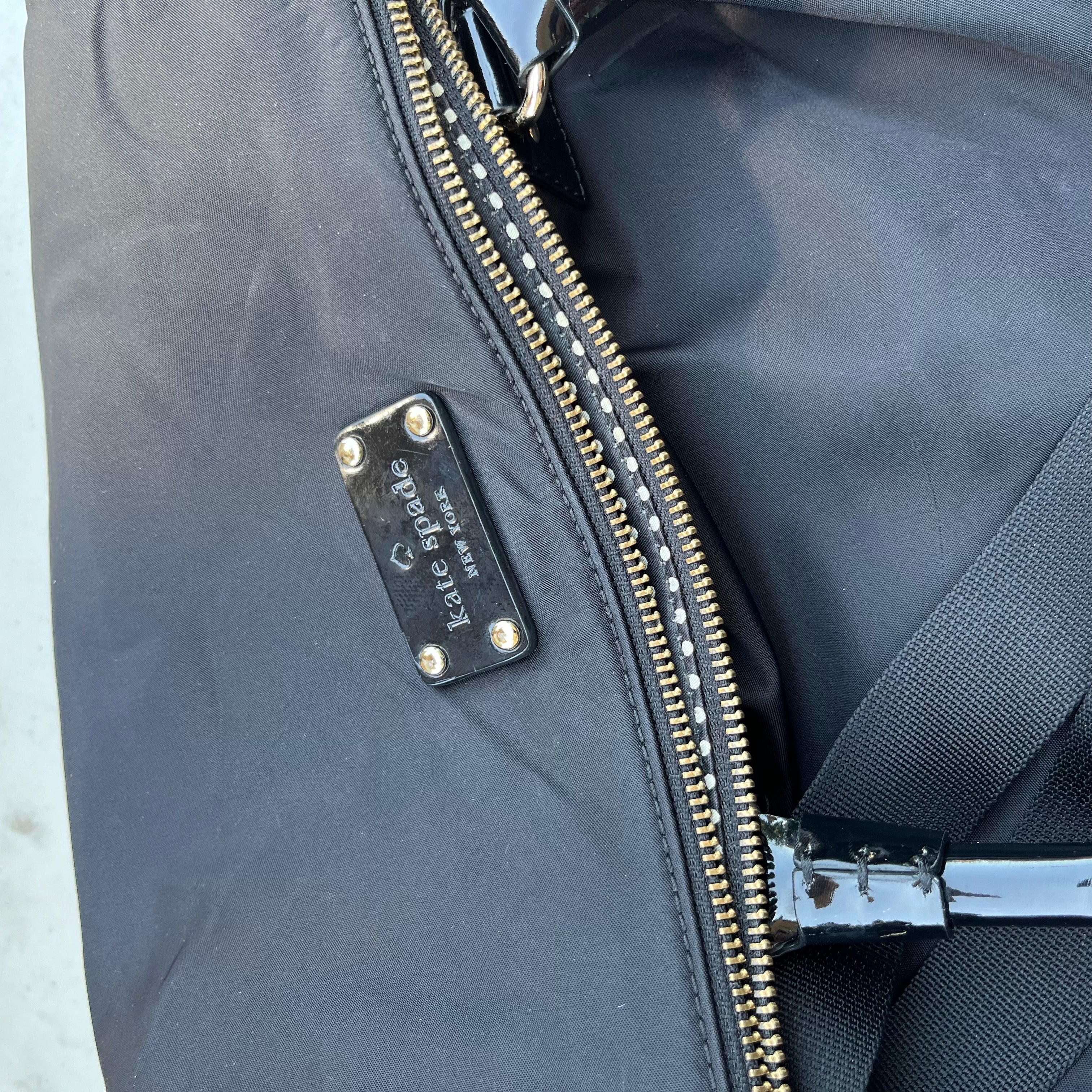 D615 Black wallet and purse grouping (Kate Spade and Guess, Guess purse has scuffing on leather)