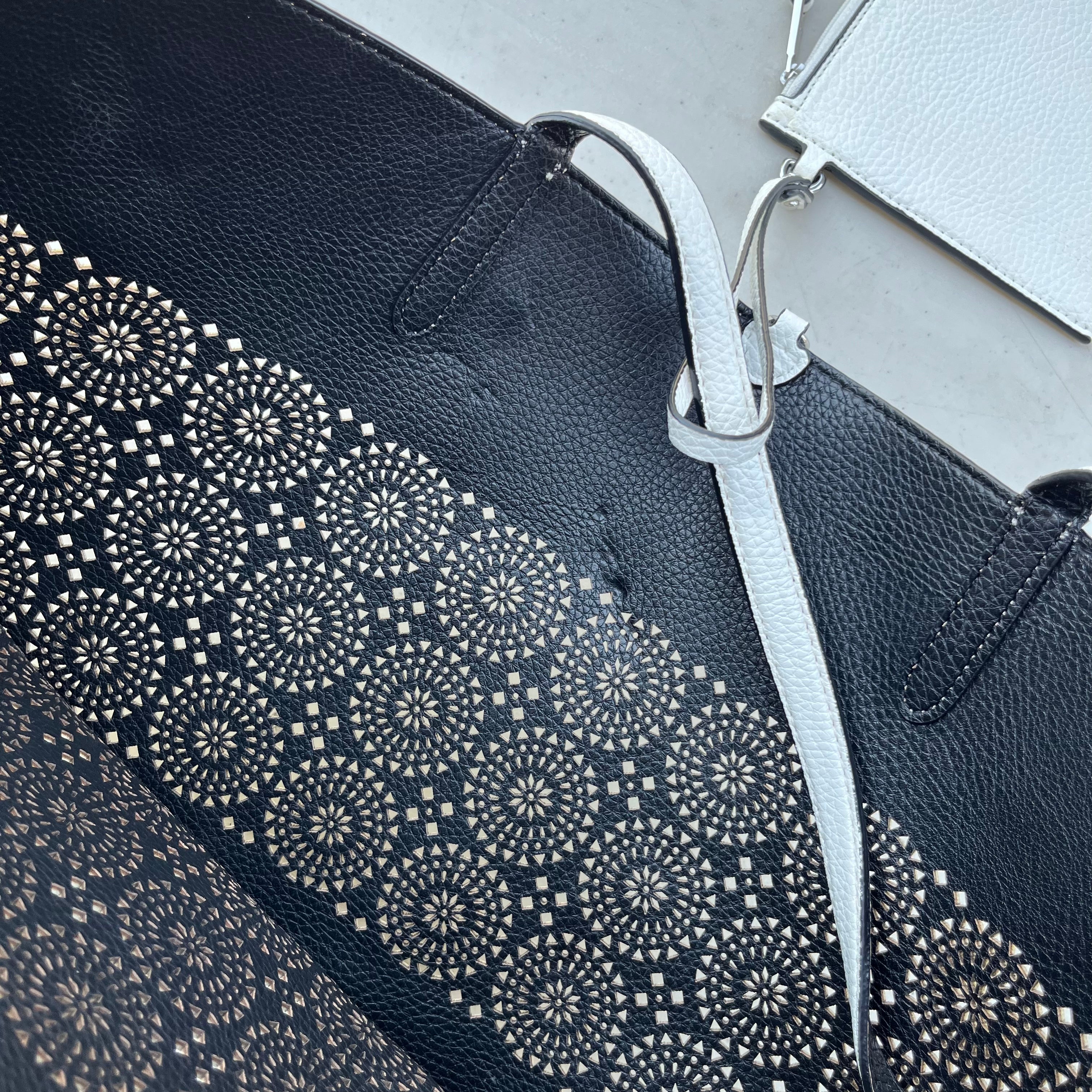 D626 Lauren Ralph Lauren white pebbled leather reversible tote bag with floral medallion cut out pattern and matching pouch