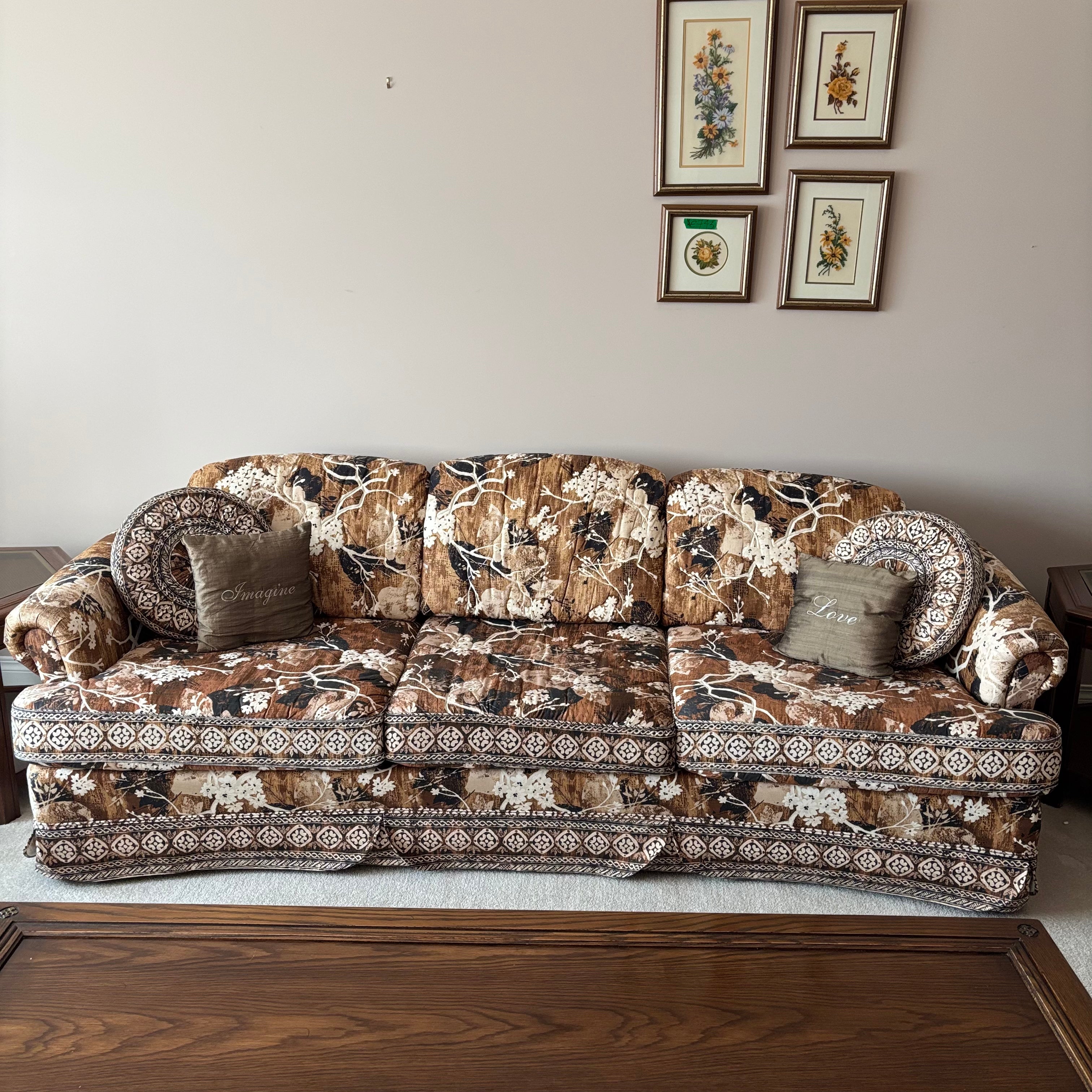 E744 Vintage upholstered brown and beige floral sofa