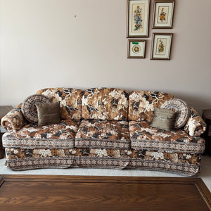 E744 Vintage upholstered brown and beige floral sofa