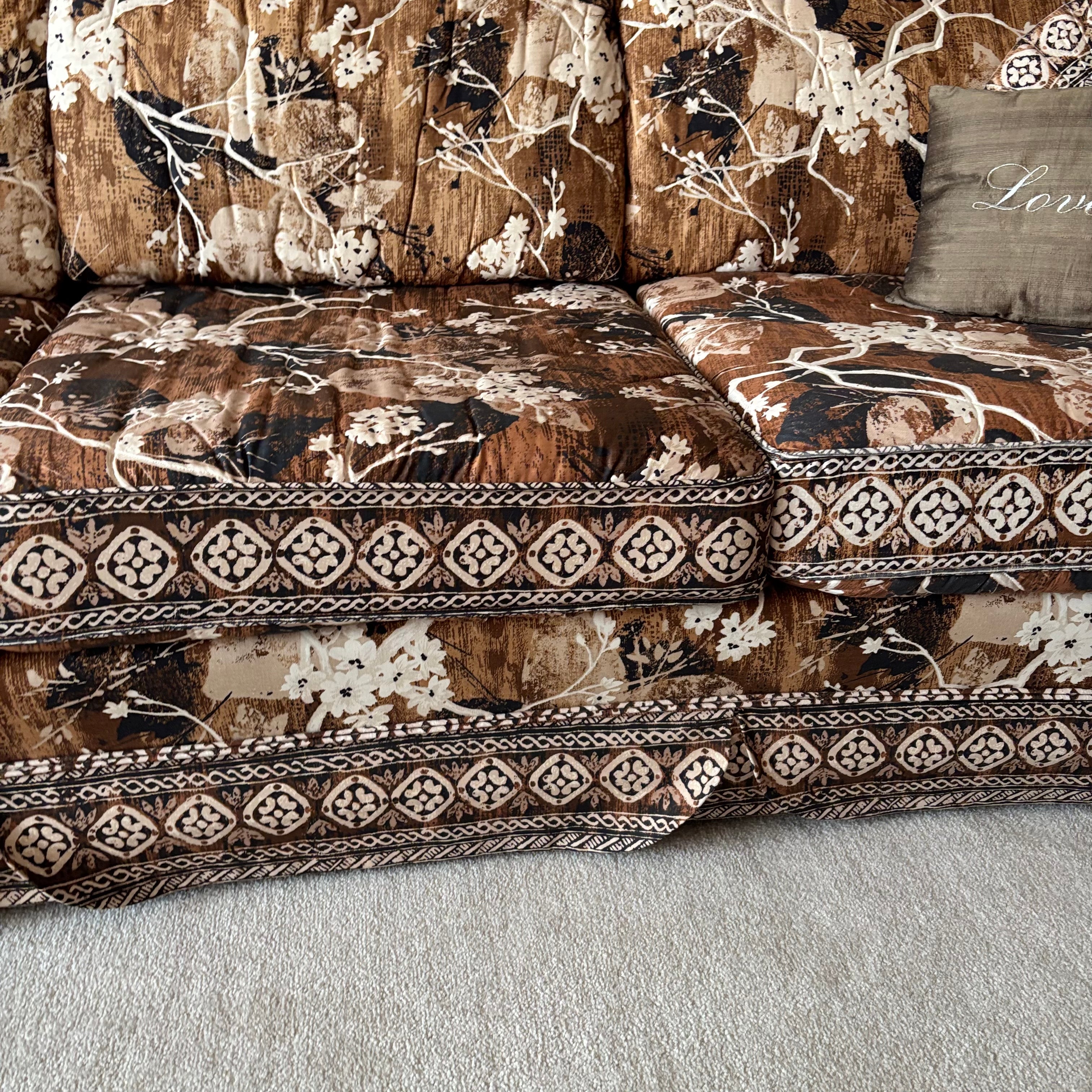 E744 Vintage upholstered brown and beige floral sofa