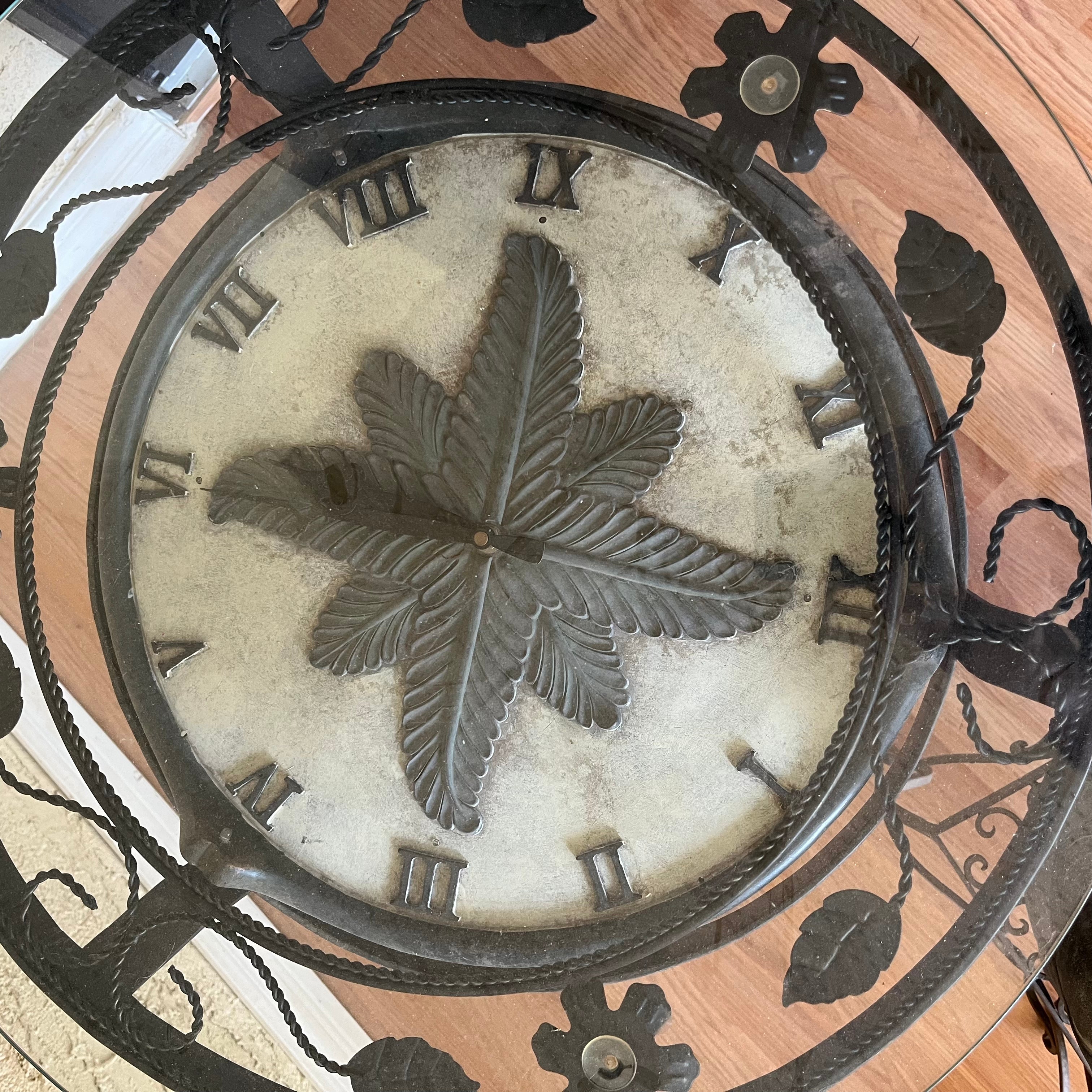 F502 Home Decor Grouping (metal end table with clock(not working) and stone Buddha with metal stand)