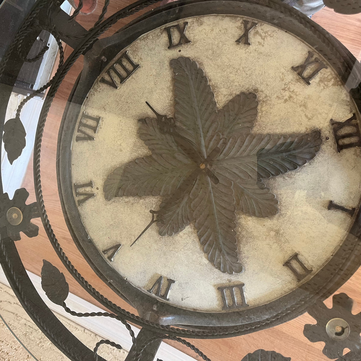 F502 Home Decor Grouping (metal end table with clock(not working) and stone Buddha with metal stand)