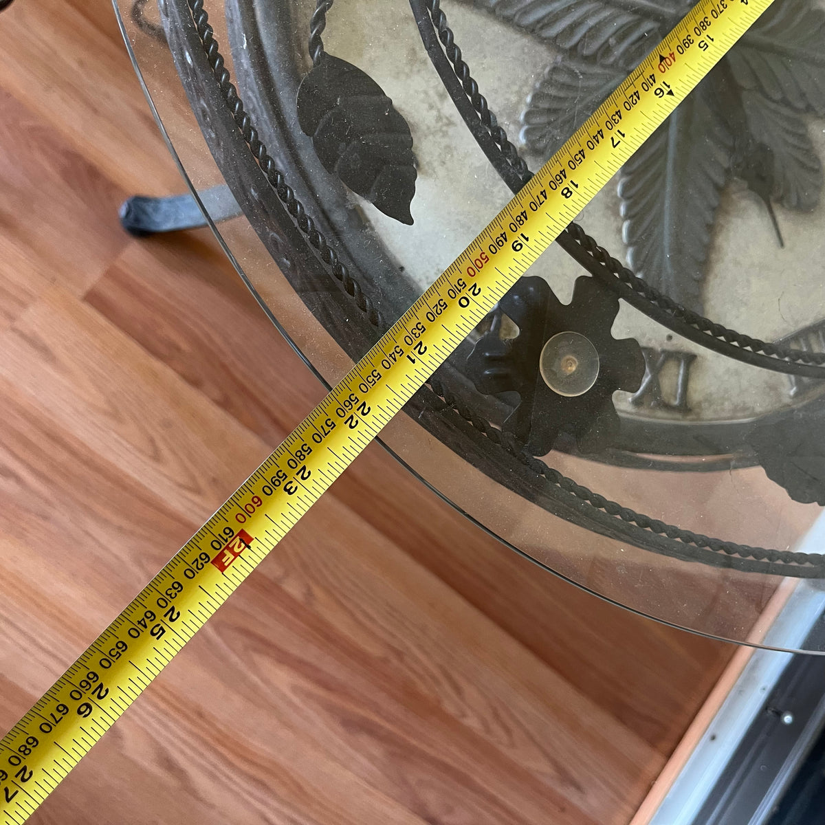 F502 Home Decor Grouping (metal end table with clock(not working) and stone Buddha with metal stand)