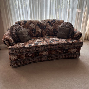 E759 Vintage upholstered brown and beige floral love seat