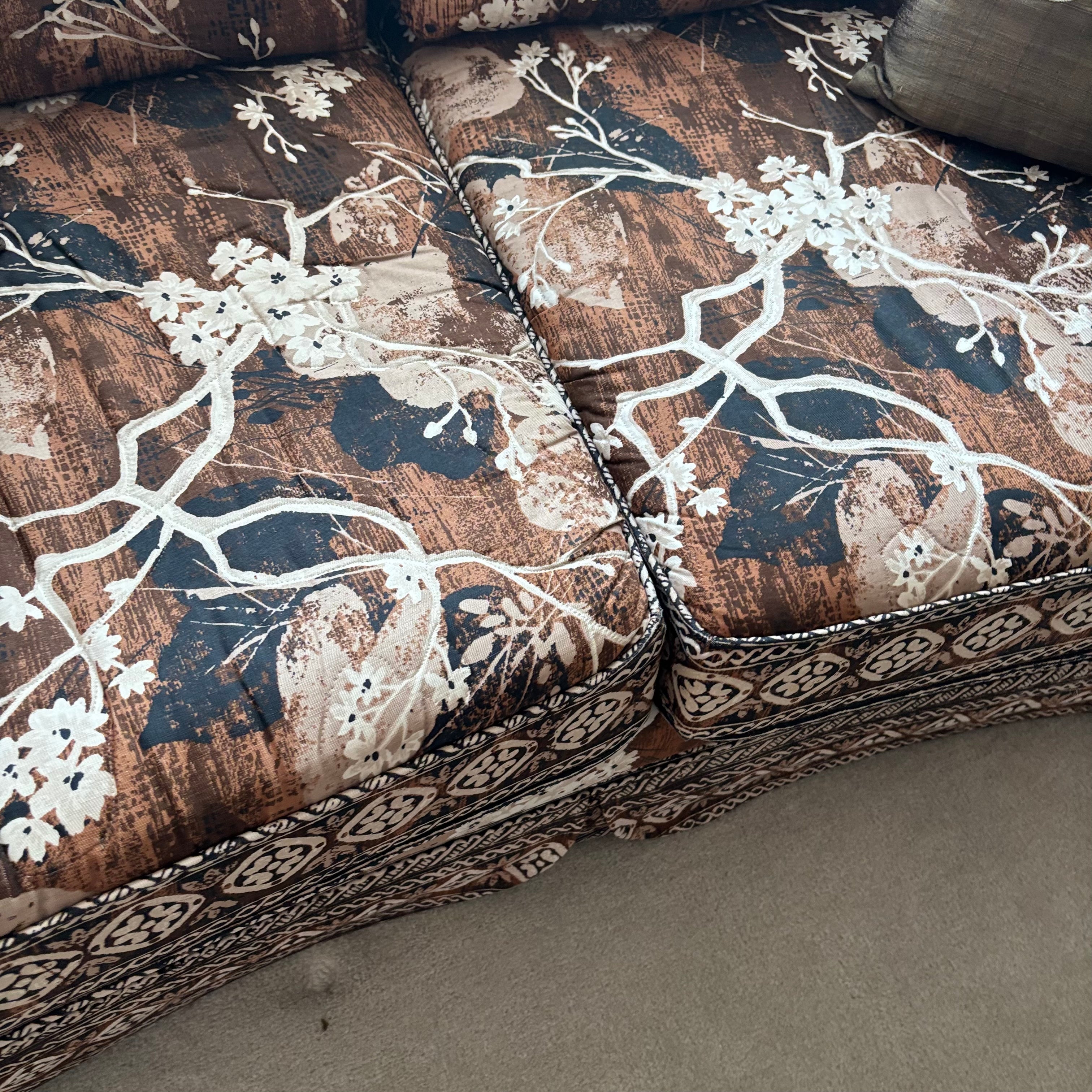 E759 Vintage upholstered brown and beige floral love seat