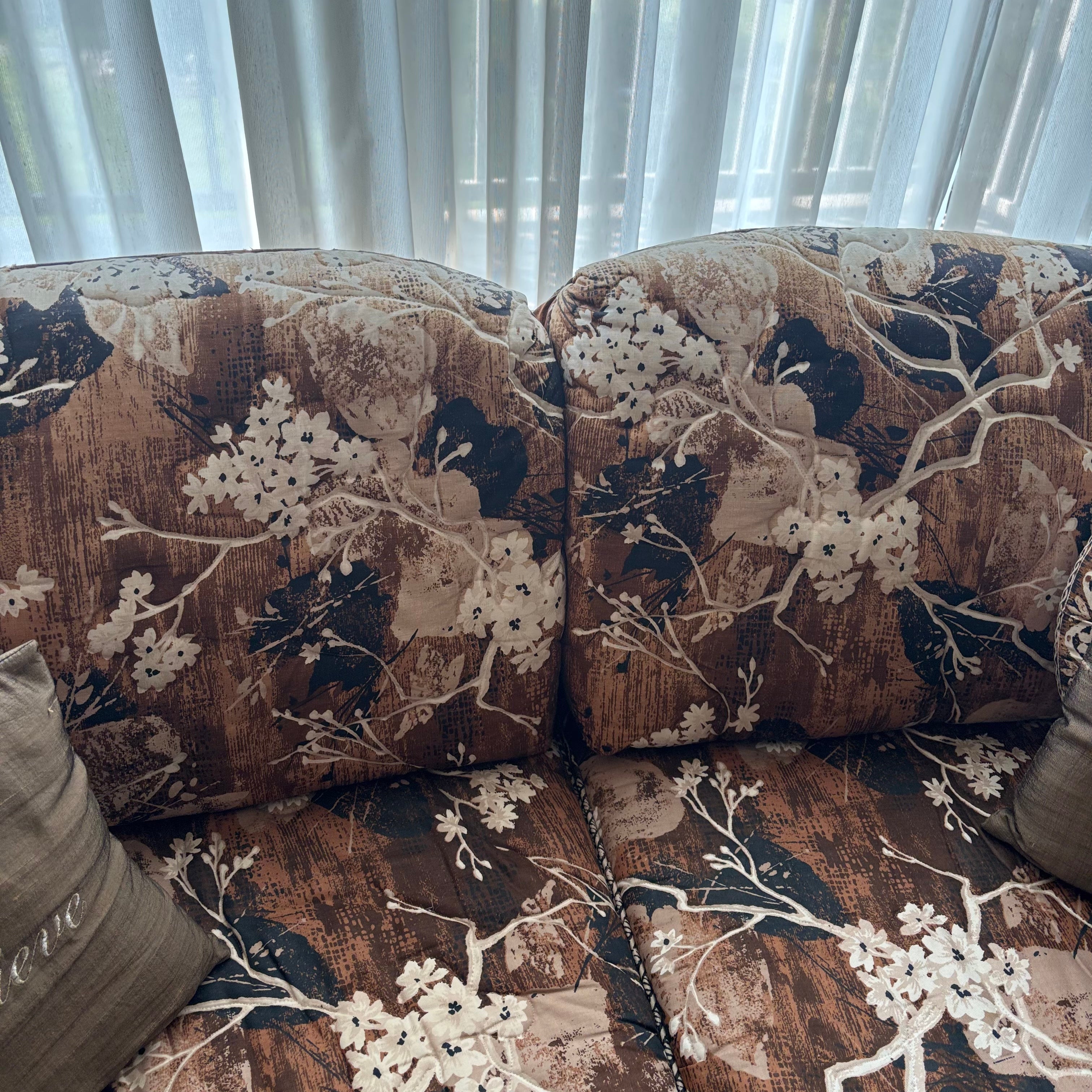 E759 Vintage upholstered brown and beige floral love seat