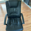 F505 Black leather wheeled office chair (small tear)