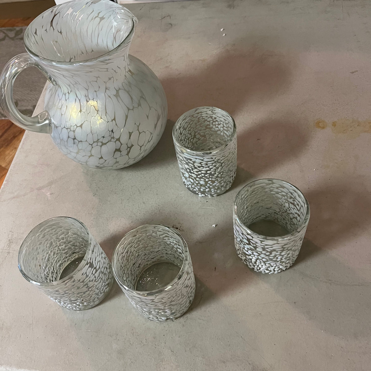 F556 Vintage artisanal pitcher and four glasses