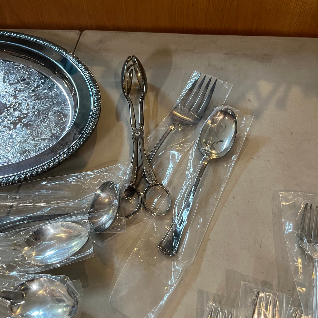 F563 Silverplate and flatware grouping