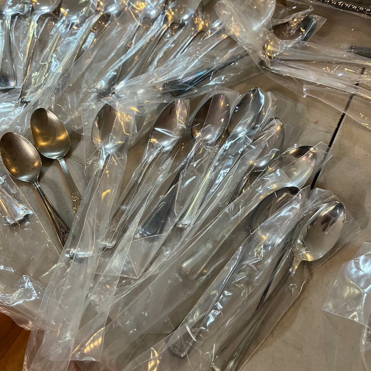 F563 Silverplate and flatware grouping