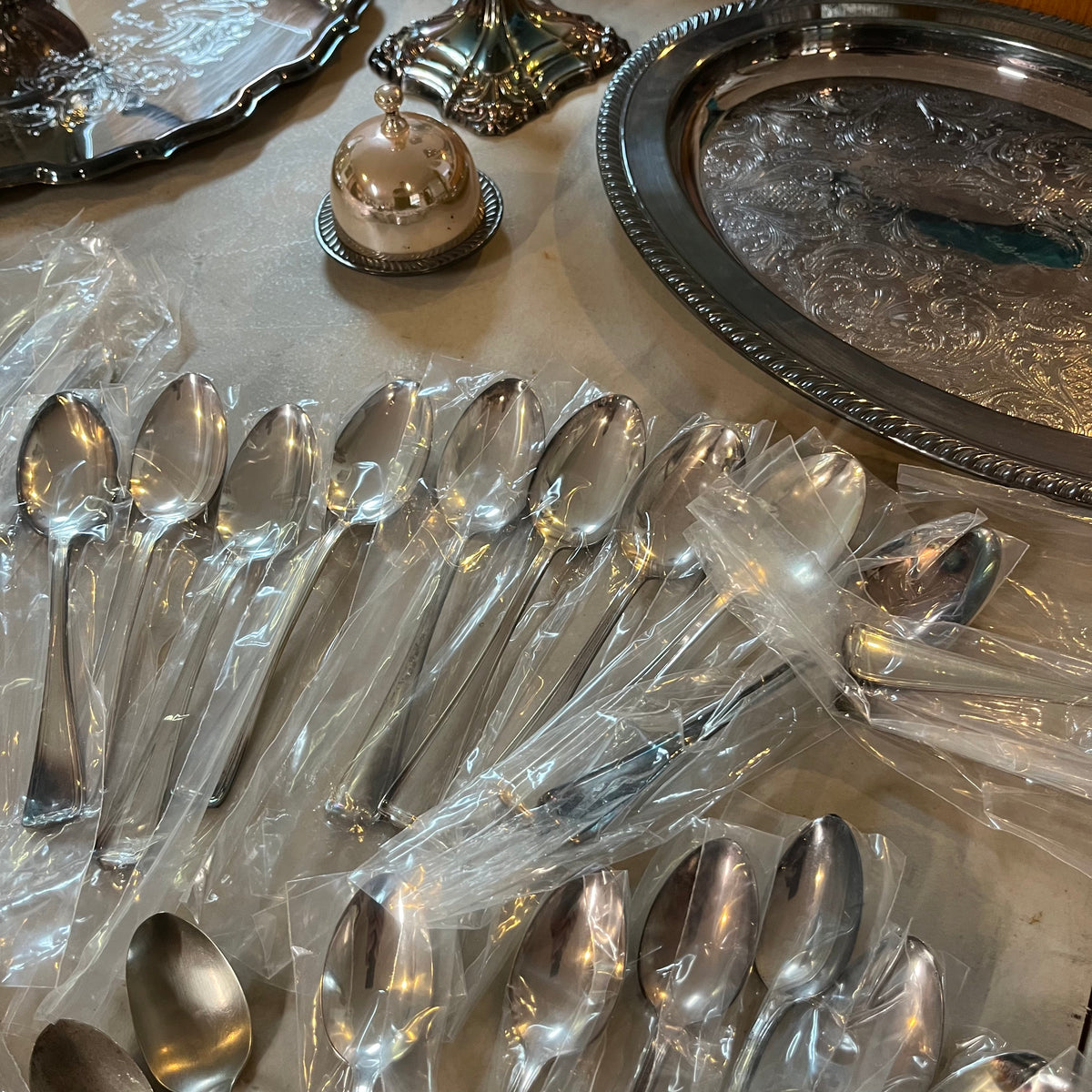 F563 Silverplate and flatware grouping