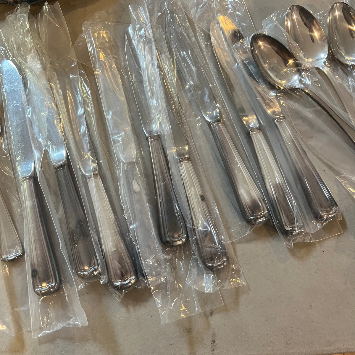 F563 Silverplate and flatware grouping