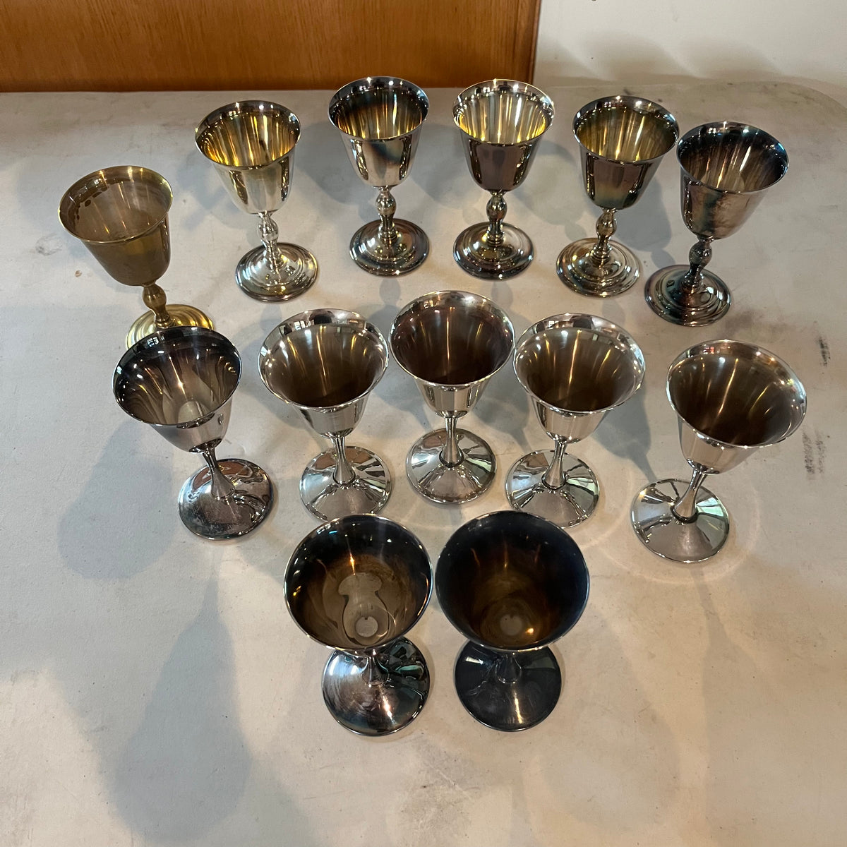 F564 Set of 13 Silver plate goblets