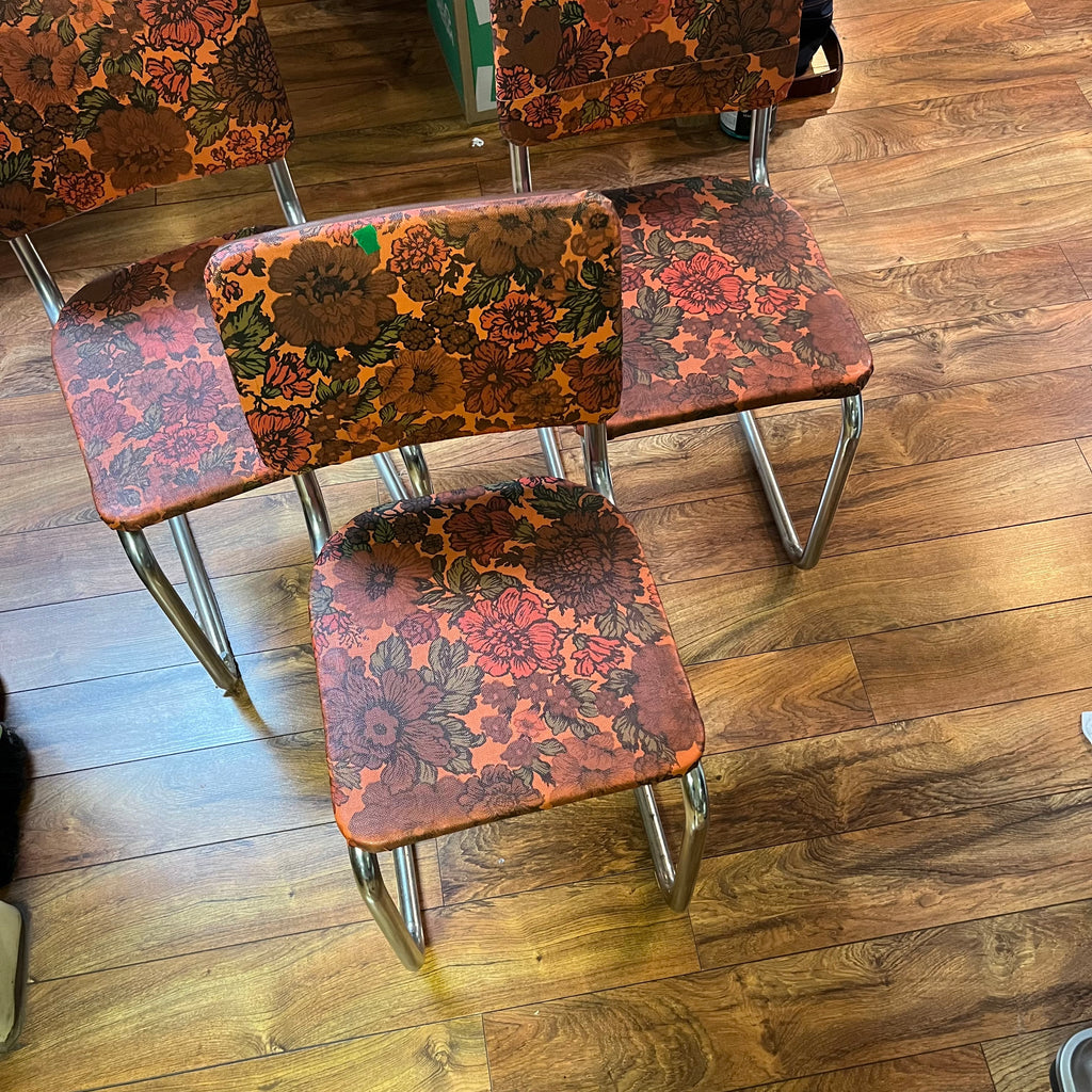 F567 Set of 3 vintage metal chairs with floral vinyl