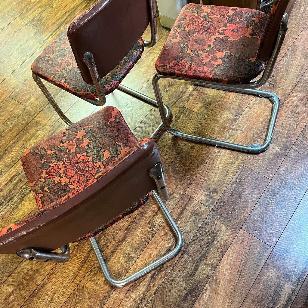 F567 Set of 3 vintage metal chairs with floral vinyl