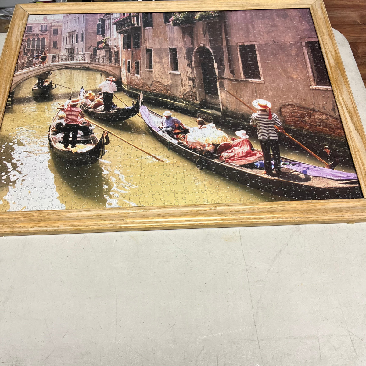 F575 Set of 2 framed puzzles (teepee scene and gondolas of Venice)