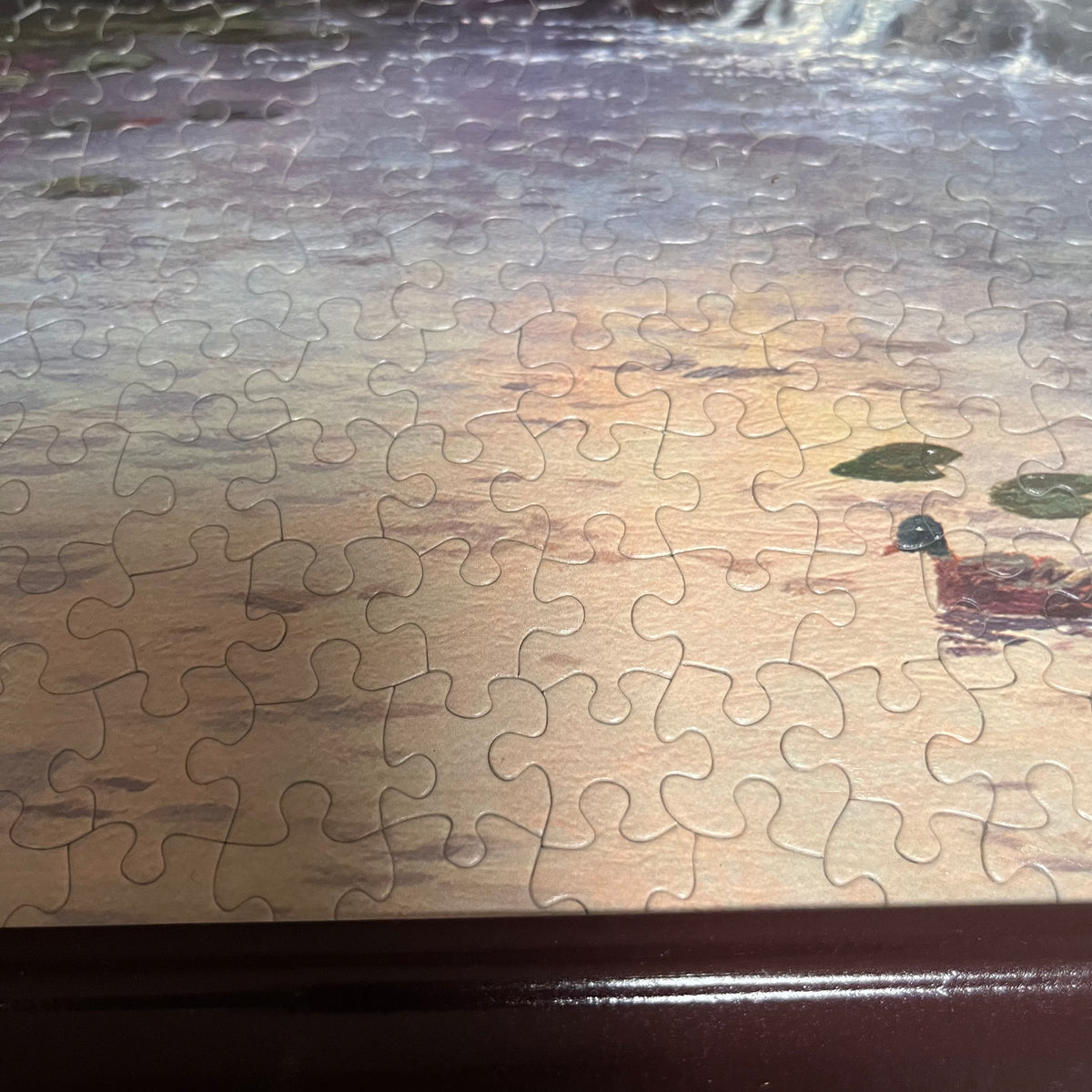 F576 Set of 2 framed puzzles (Thomas Kinkade)