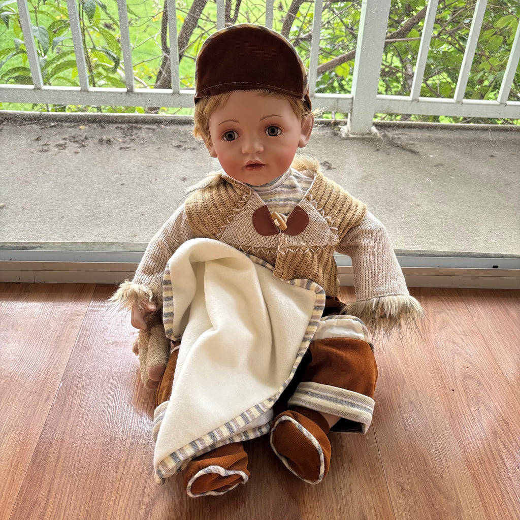 F101 Vintage Vanessa Ricardo porcelain doll with blanket