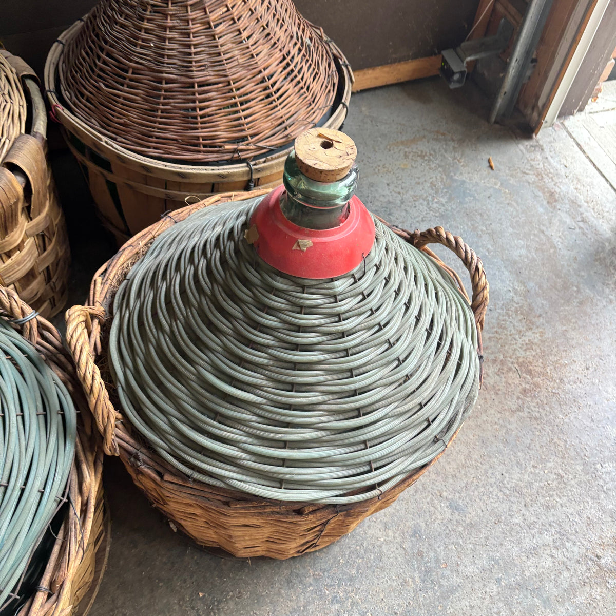 F131 Set of 6 Vintage Wicker Demijohns