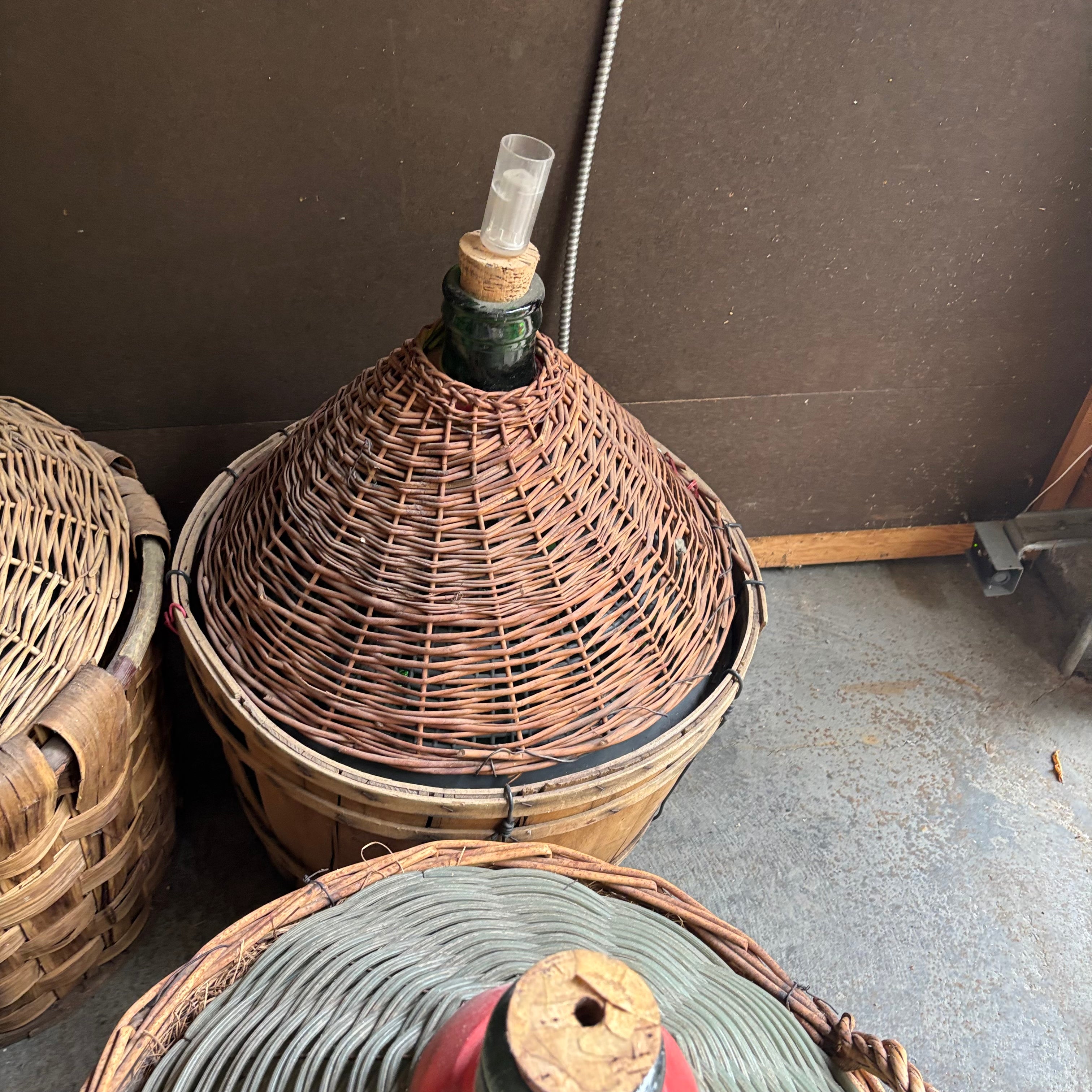 F131 Set of 6 Vintage Wicker Demijohns