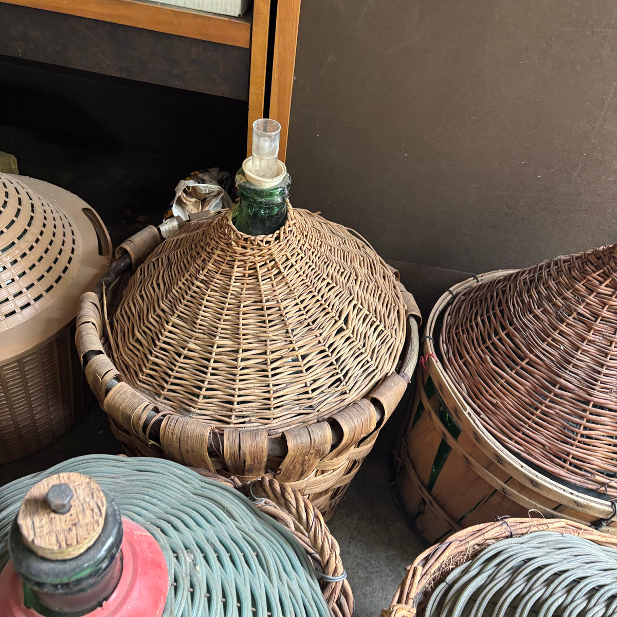 F131 Set of 6 Vintage Wicker Demijohns