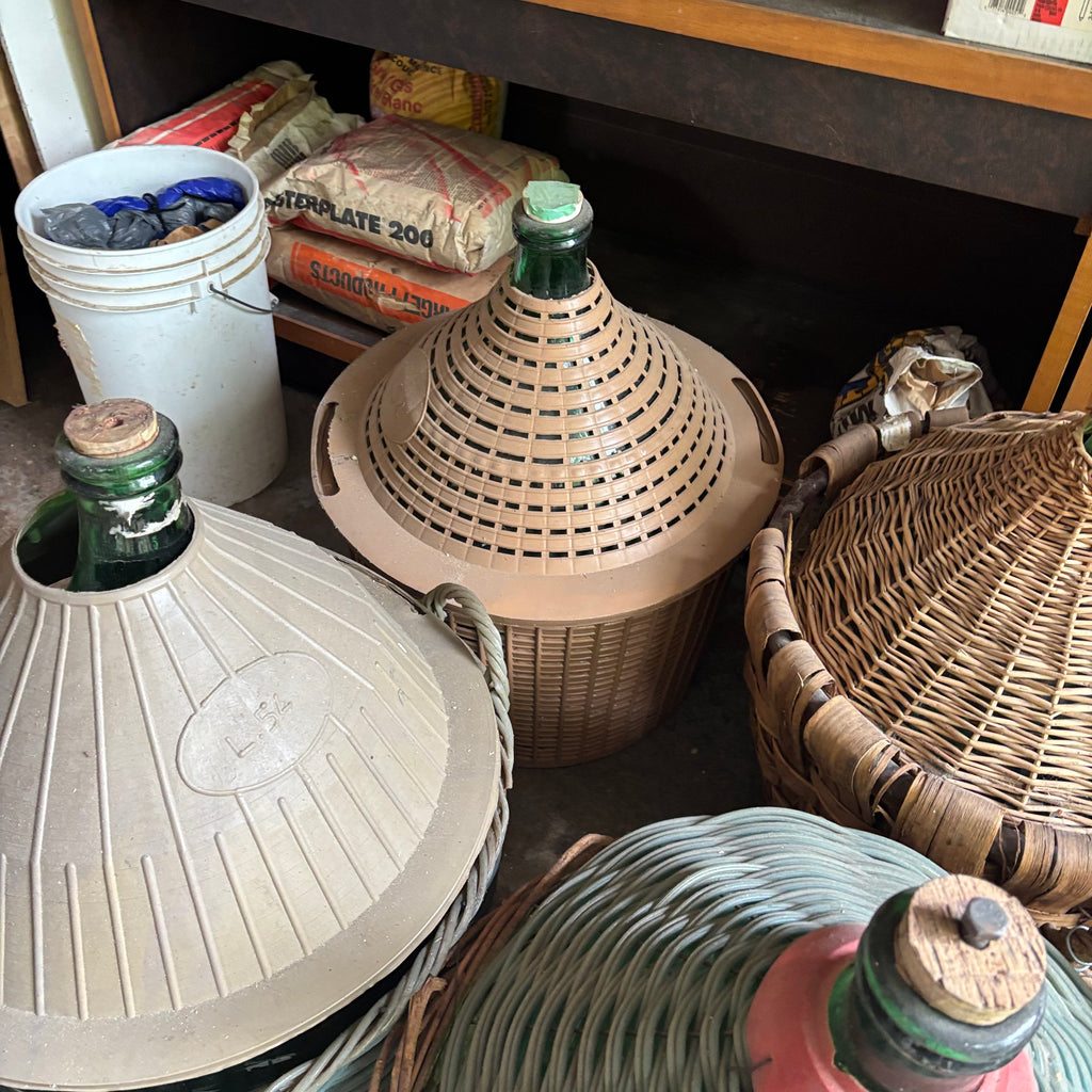 F131 Set of 6 Vintage Wicker Demijohns
