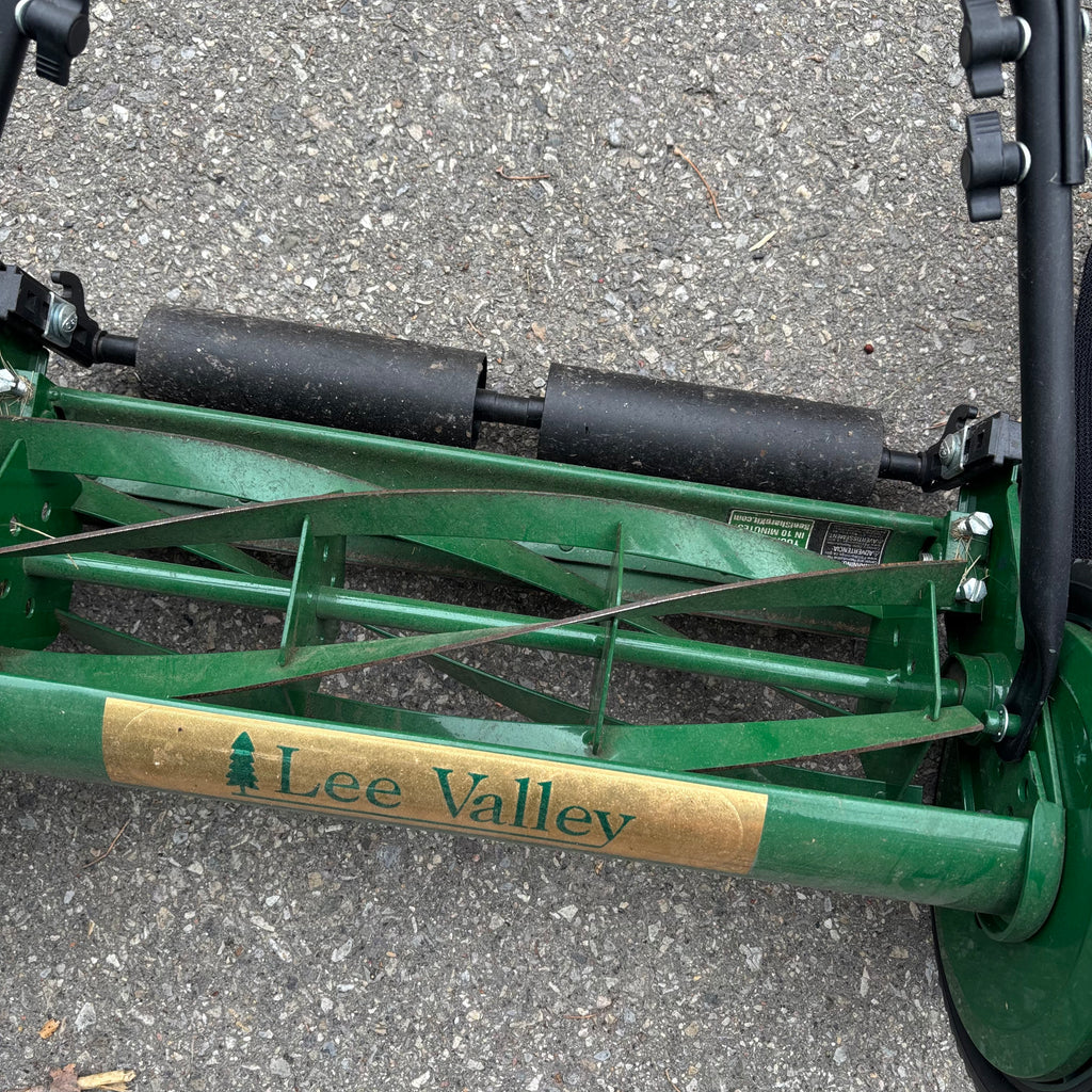 F132 Lee Valley push mower with bag