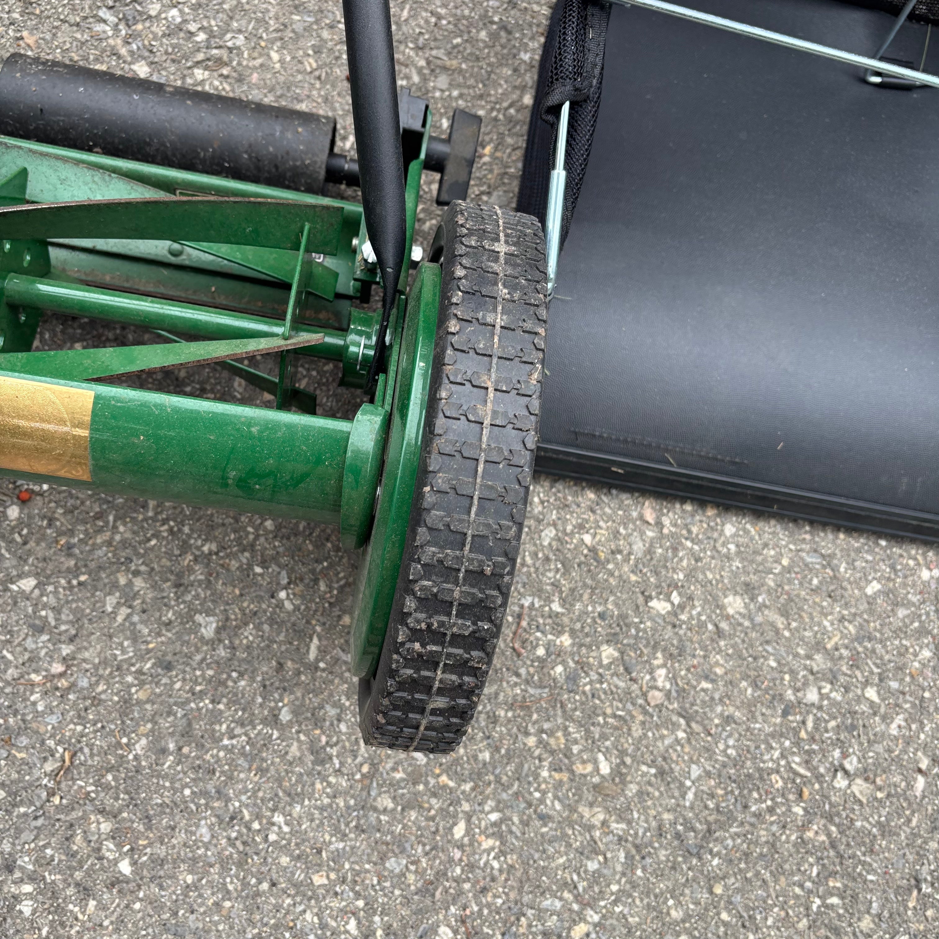 F132 Lee Valley push mower with bag