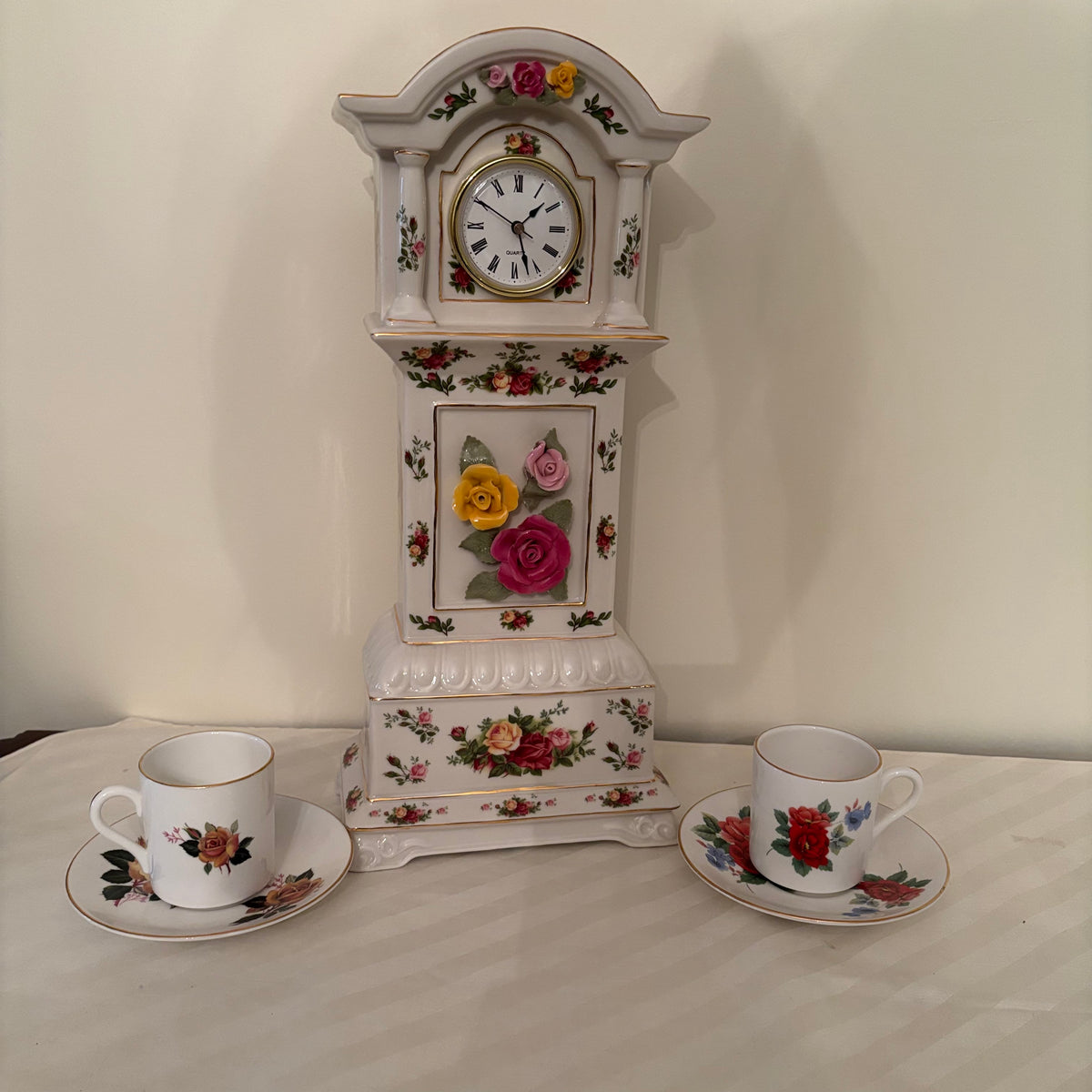 F172 China Grouping (Royal Albert Old Country Rose clock and Royal Grafton tea cups)