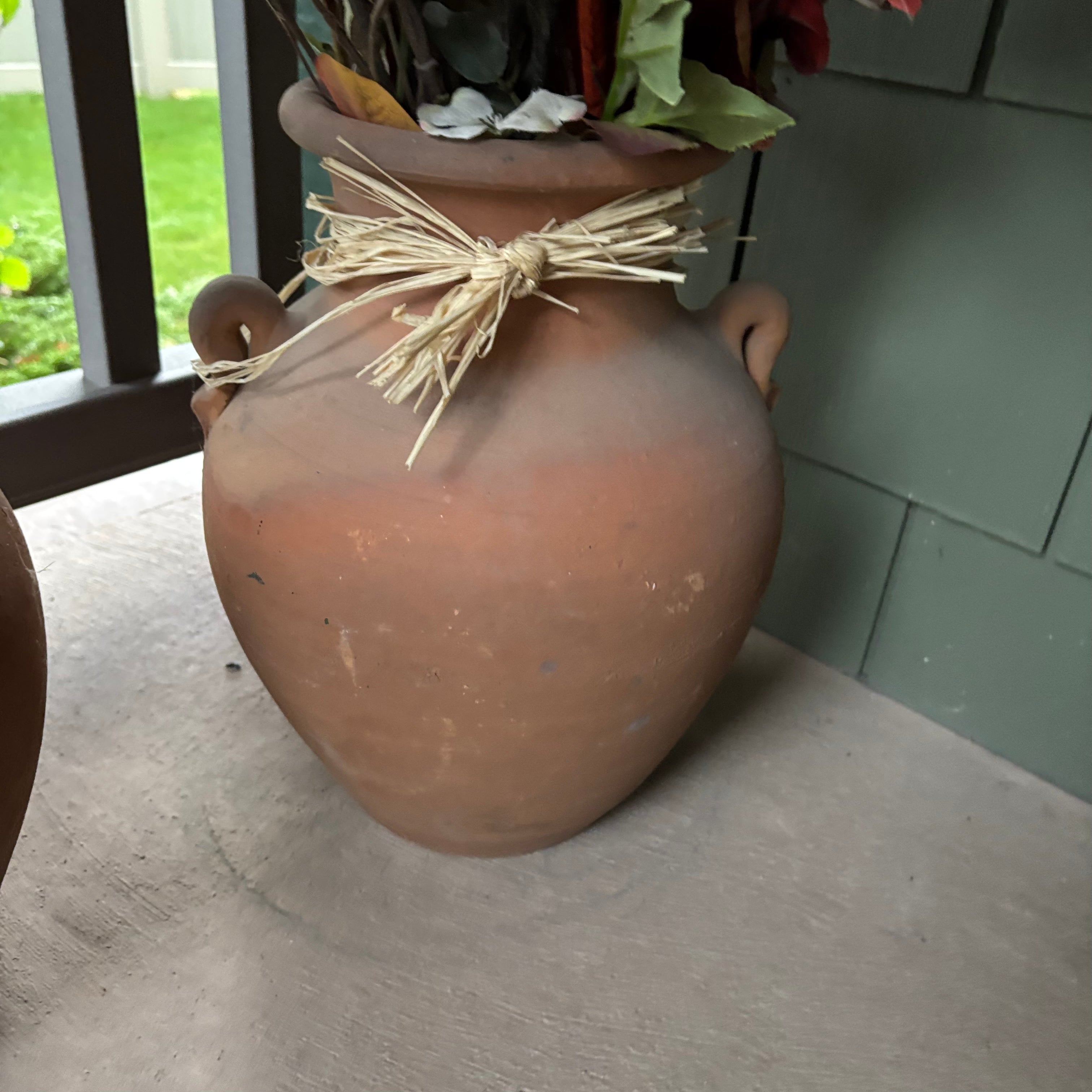 F808 Faux flower grouping in terracotta pots