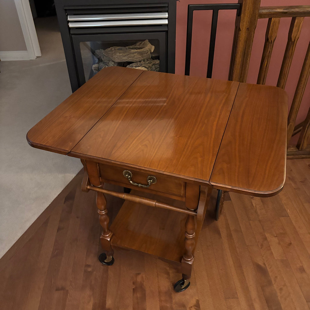 F824 Vintage wooden rolling tea cart with drop leaves