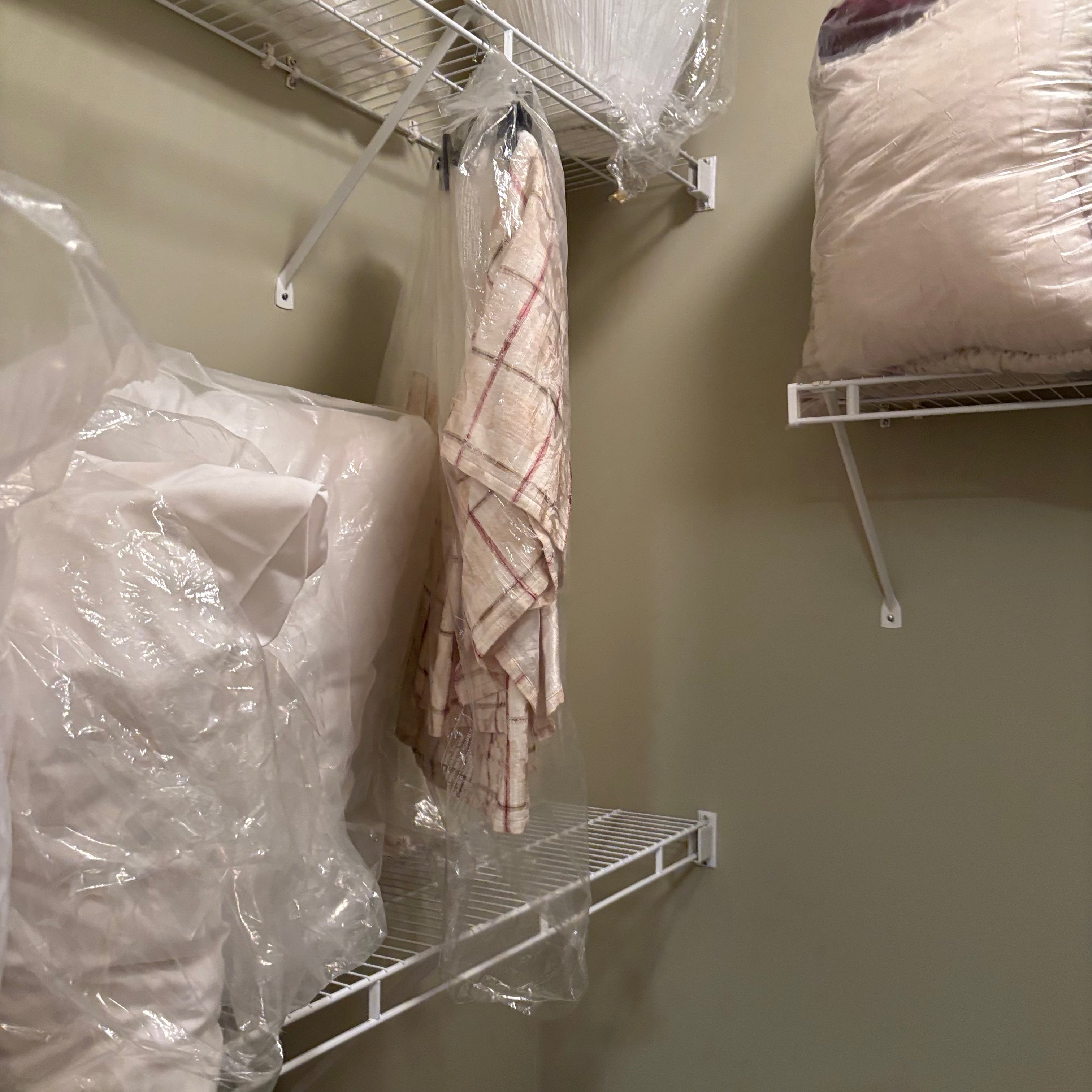 F838 Linen closet contents (gold hangers and more)