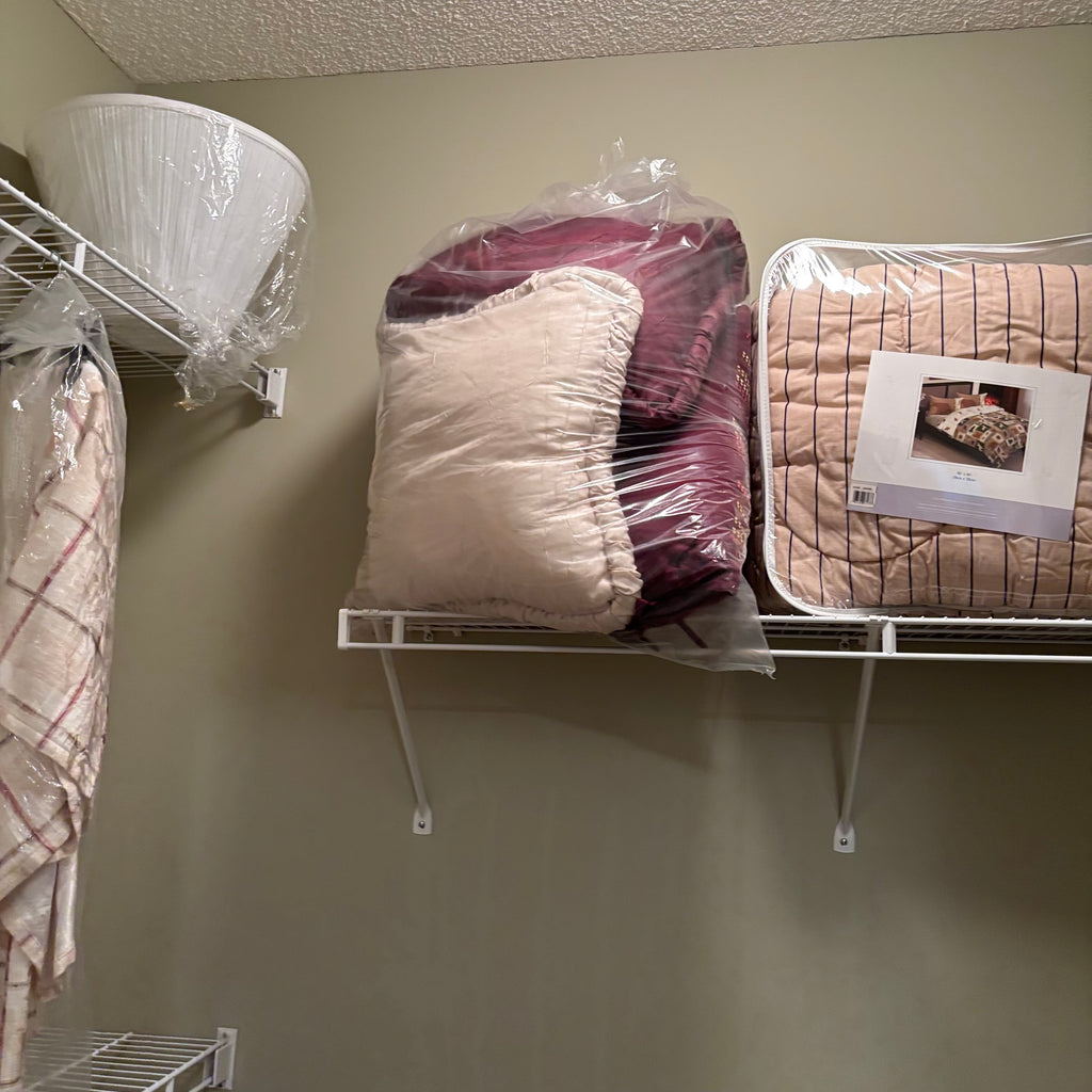 F838 Linen closet contents (gold hangers and more)