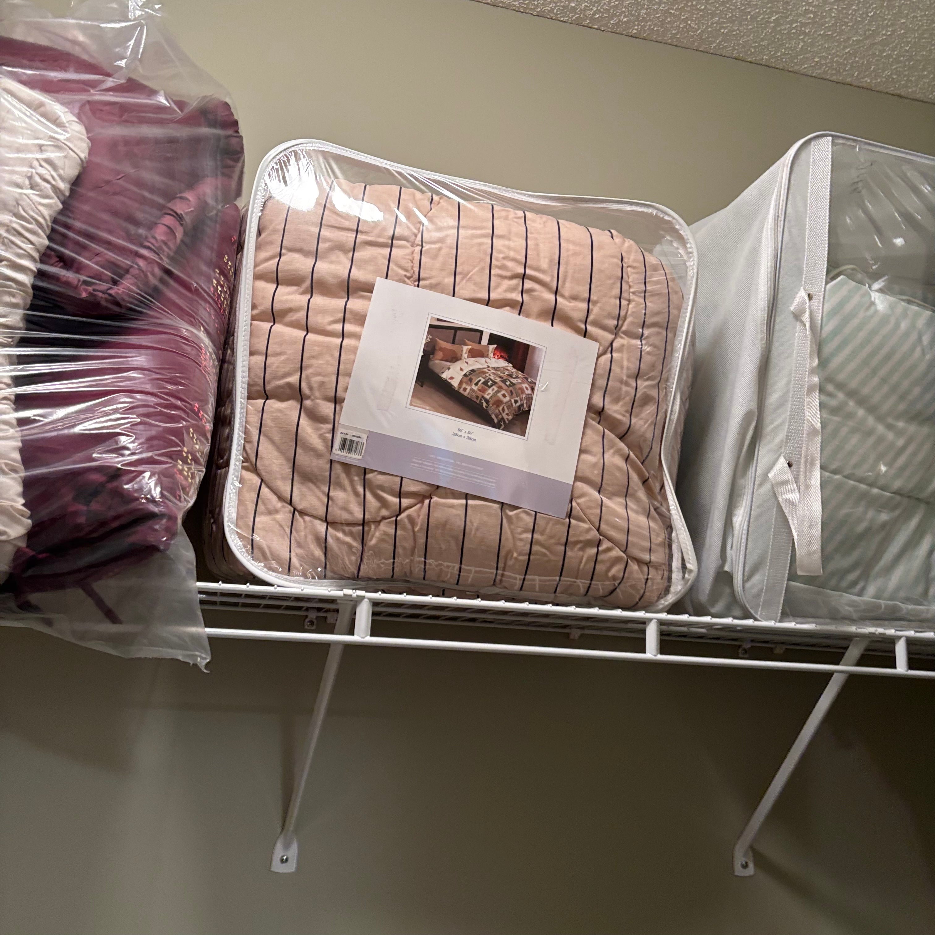 F838 Linen closet contents (gold hangers and more)