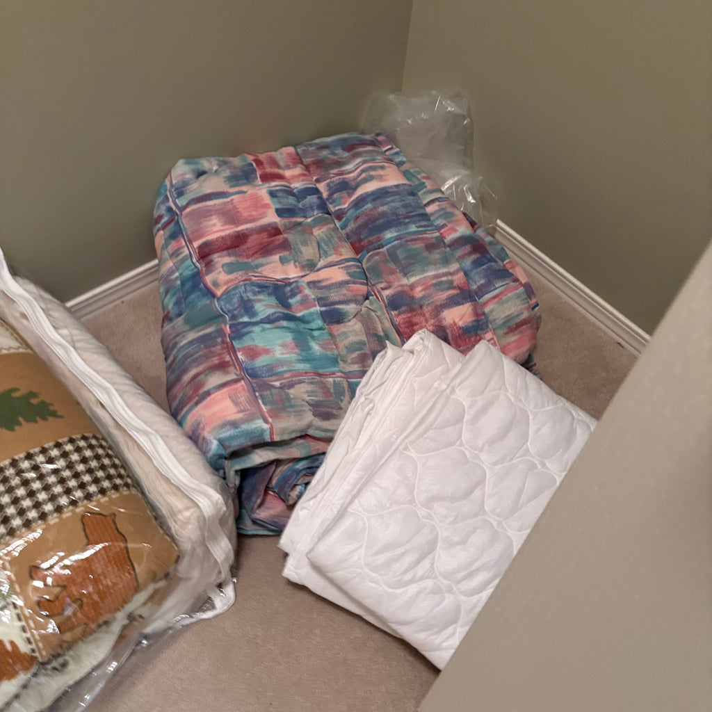 F838 Linen closet contents (gold hangers and more)