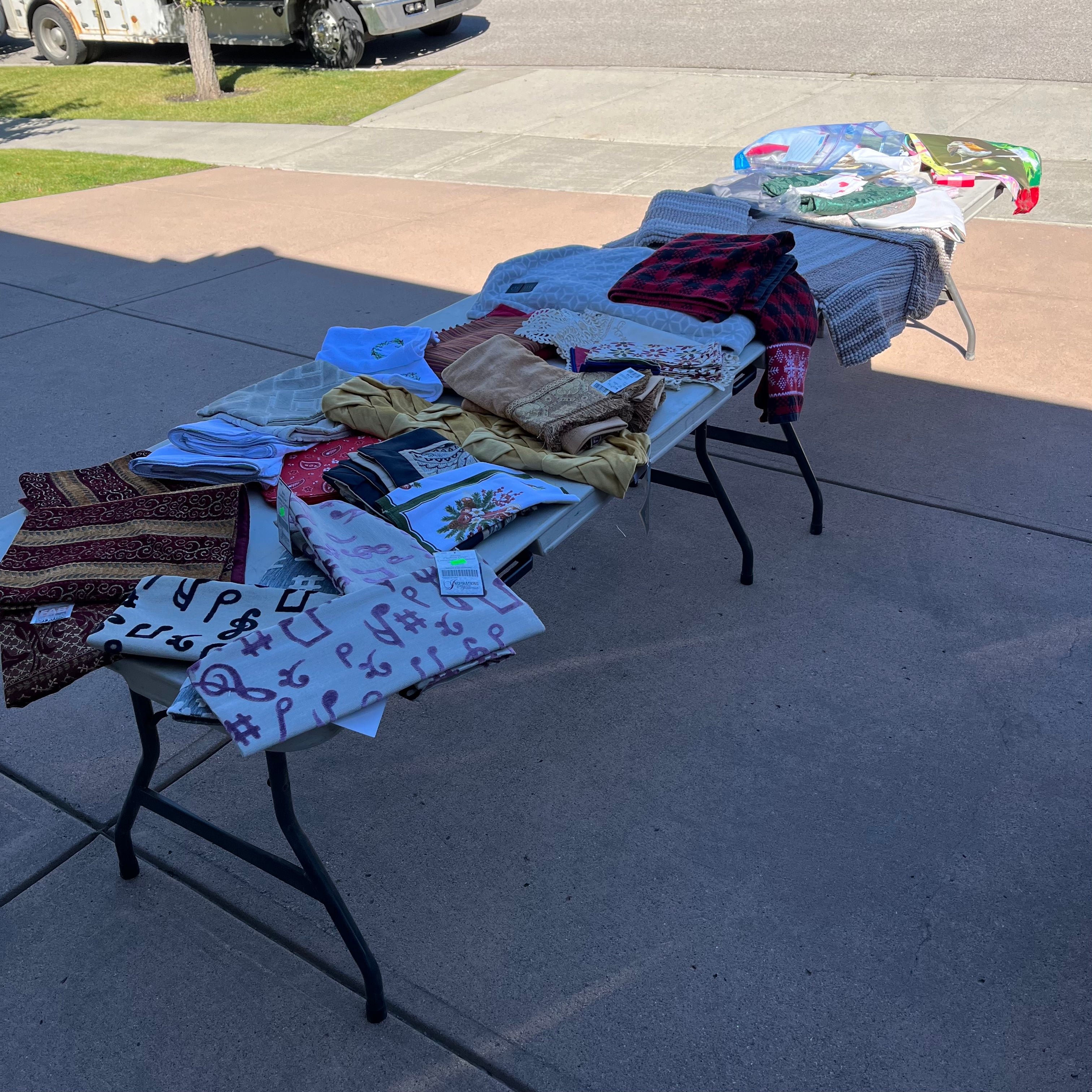 D714 Groupings of linens and flags and more (tables not included)