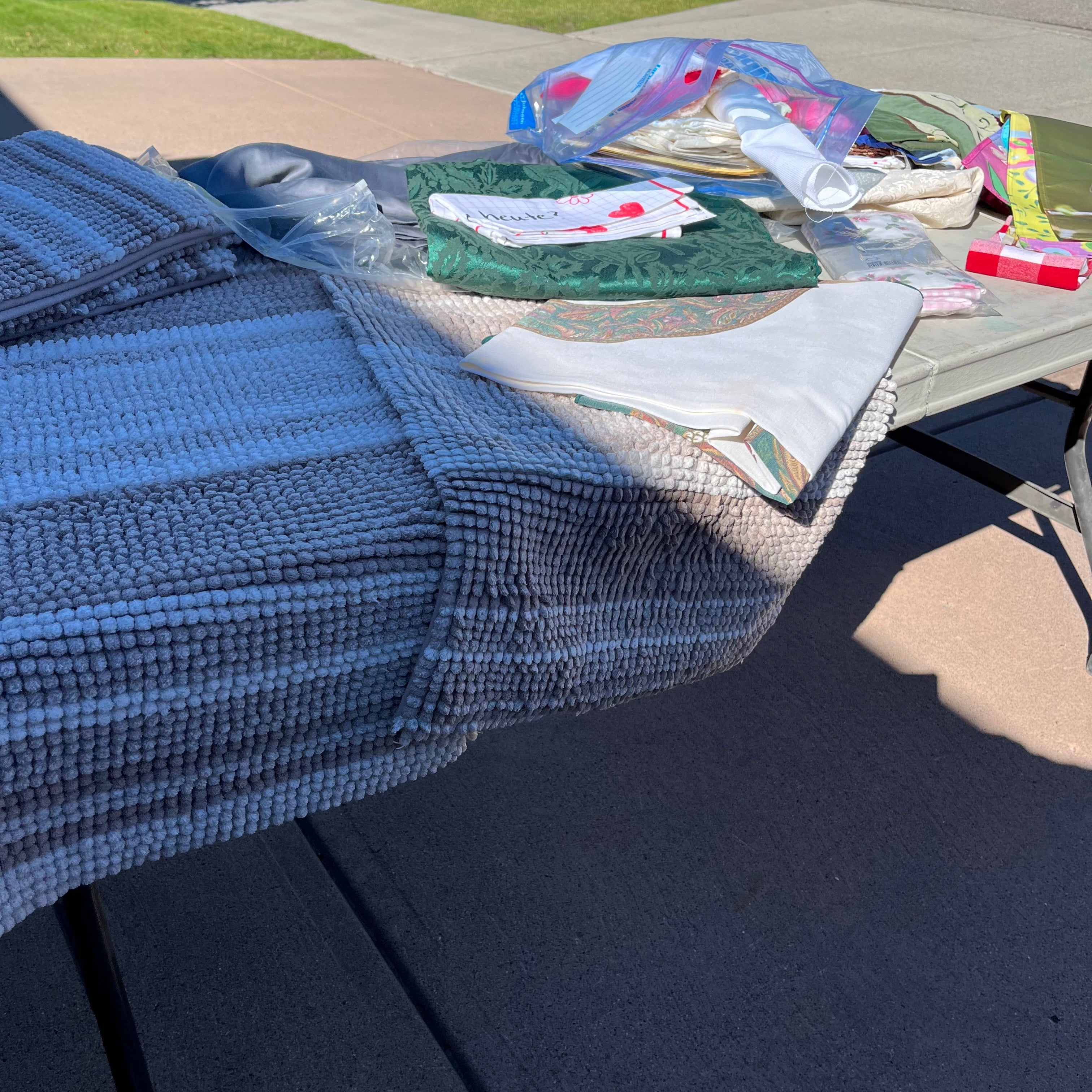 D714 Groupings of linens and flags and more (tables not included)