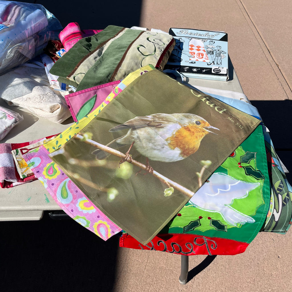 D714 Groupings of linens and flags and more (tables not included)