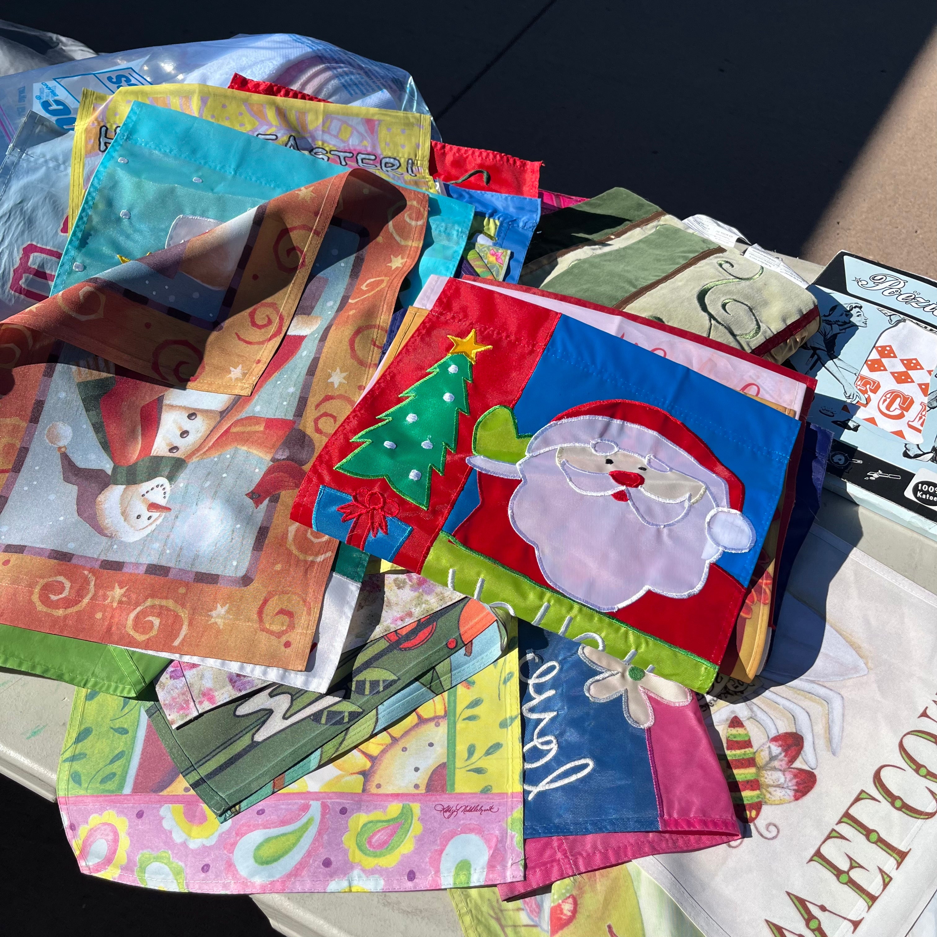 D714 Groupings of linens and flags and more (tables not included)