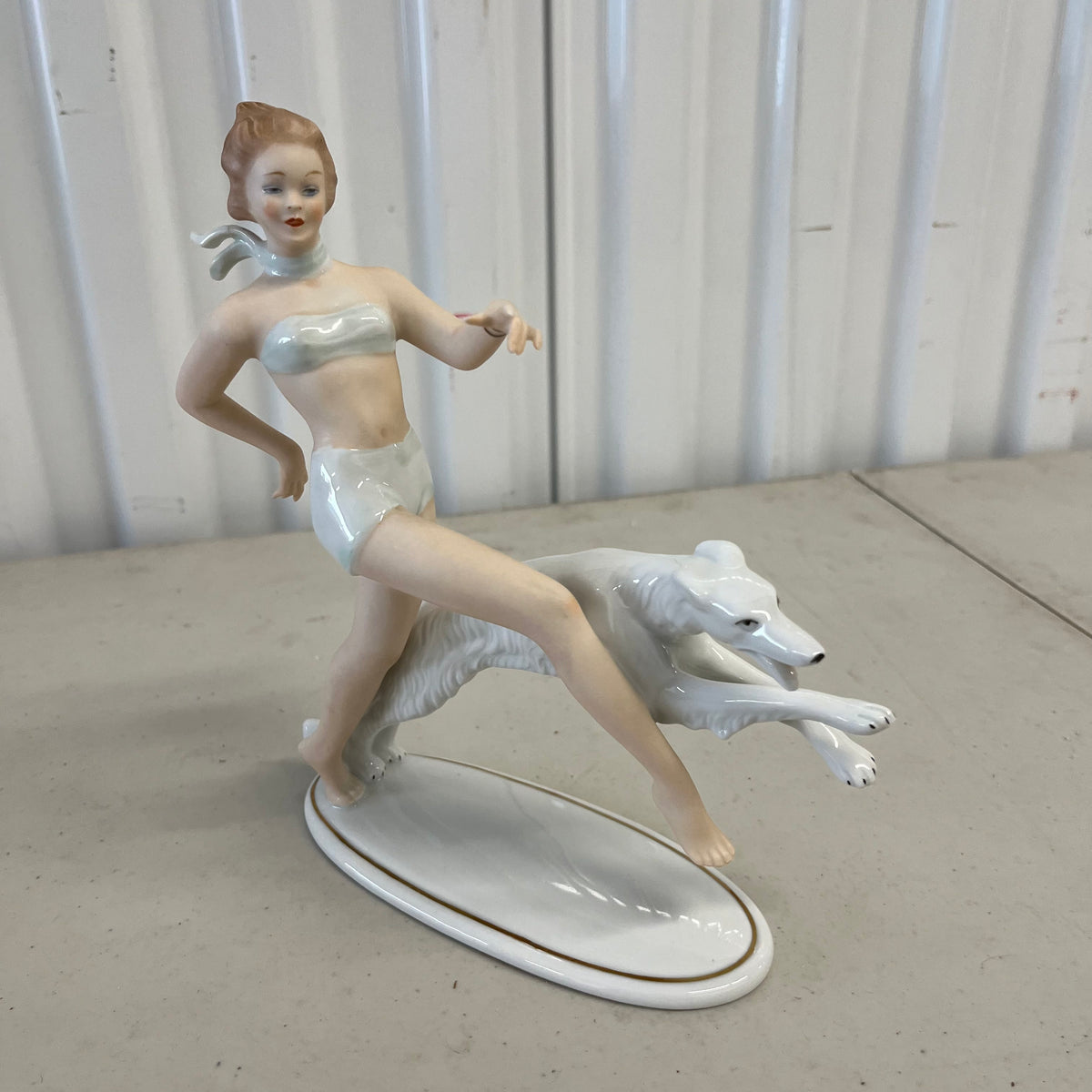 U963 Vintage Shau Bach Kunst porcelain figurine (lady and dog)