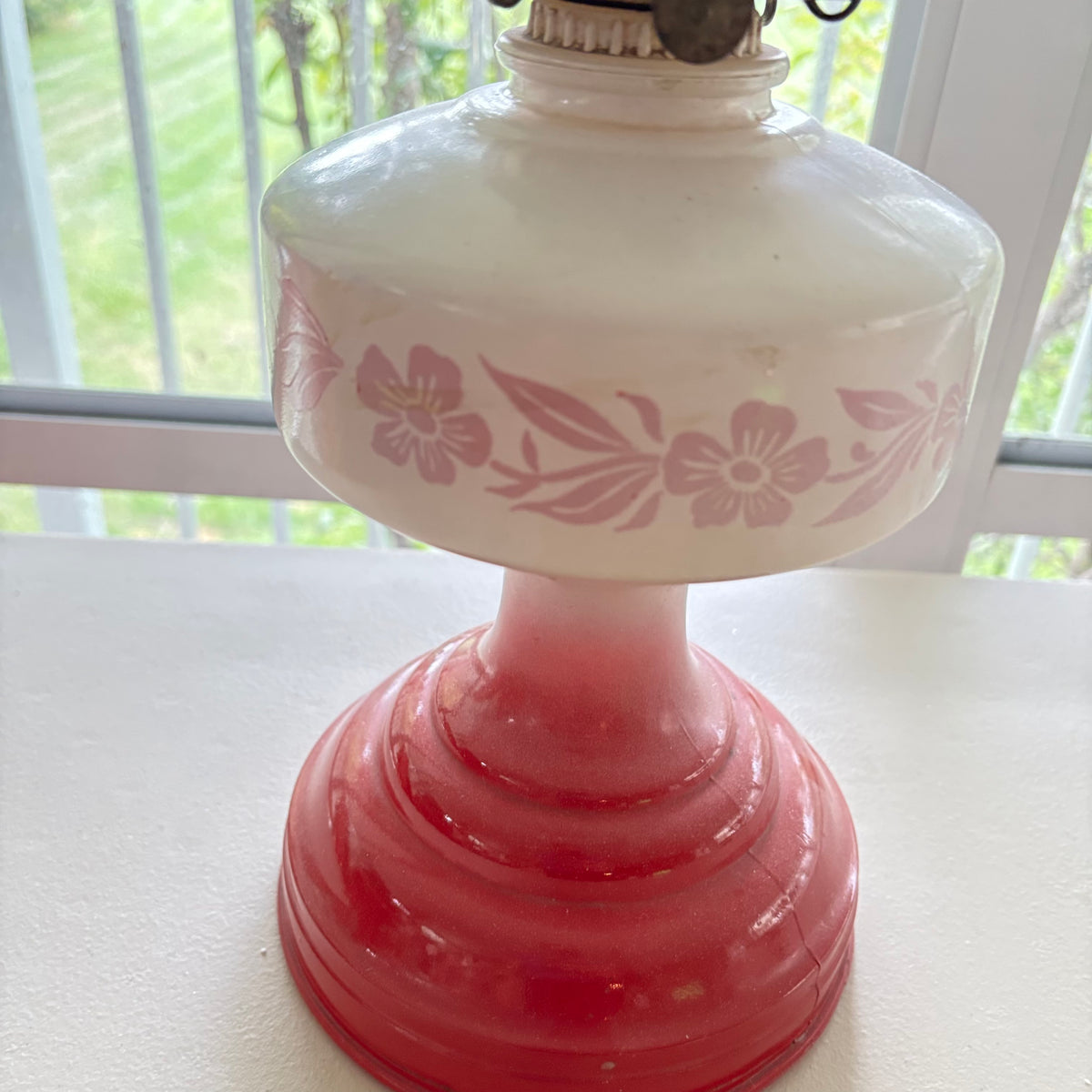F229 Vintage oil lamp with red/pink glass base